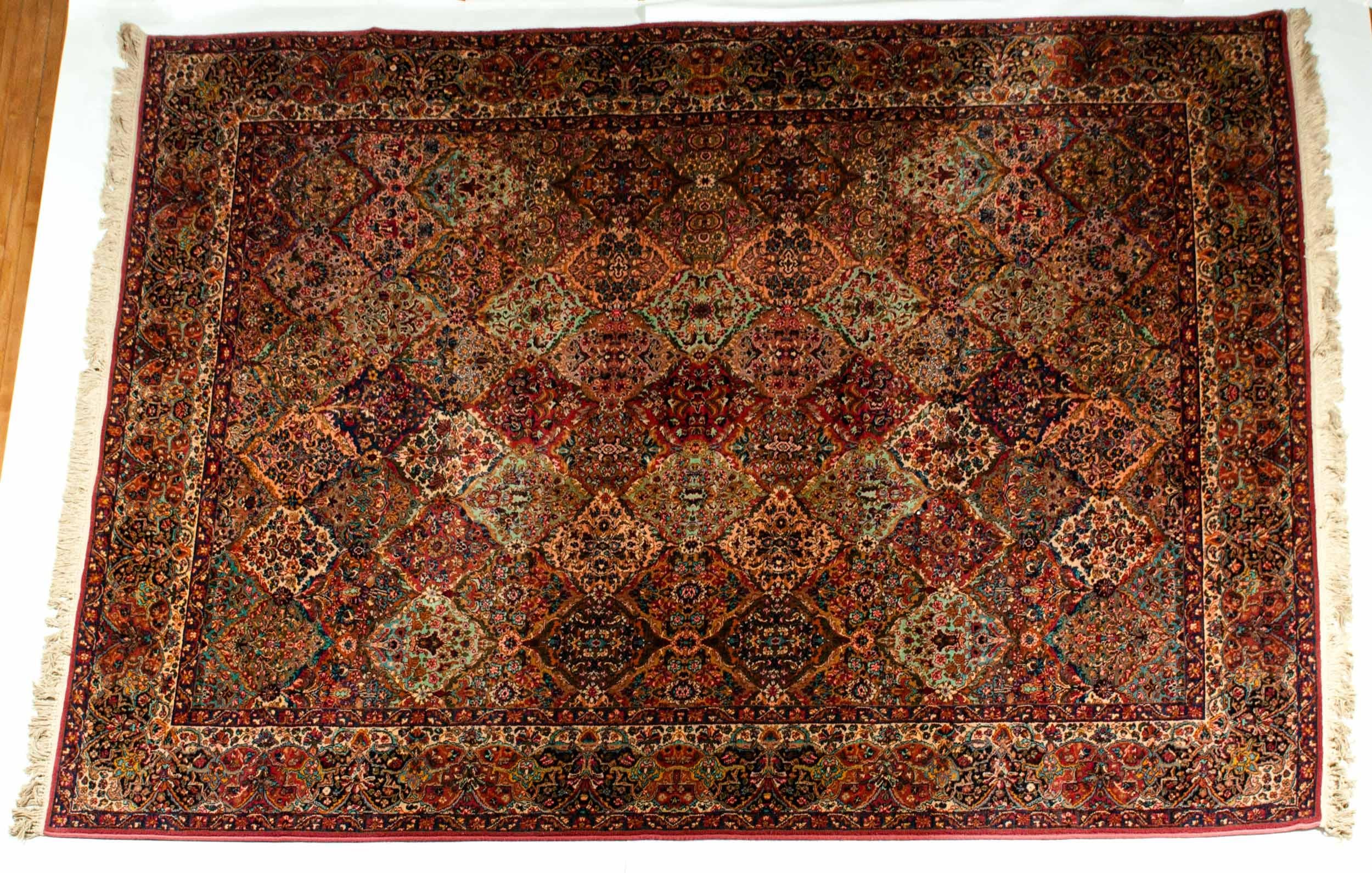 Handmade one hundred percent wool knotted North American rug. The rug is in great vintage condition and very clean. The rug measure about 175 inches x 120 inches.