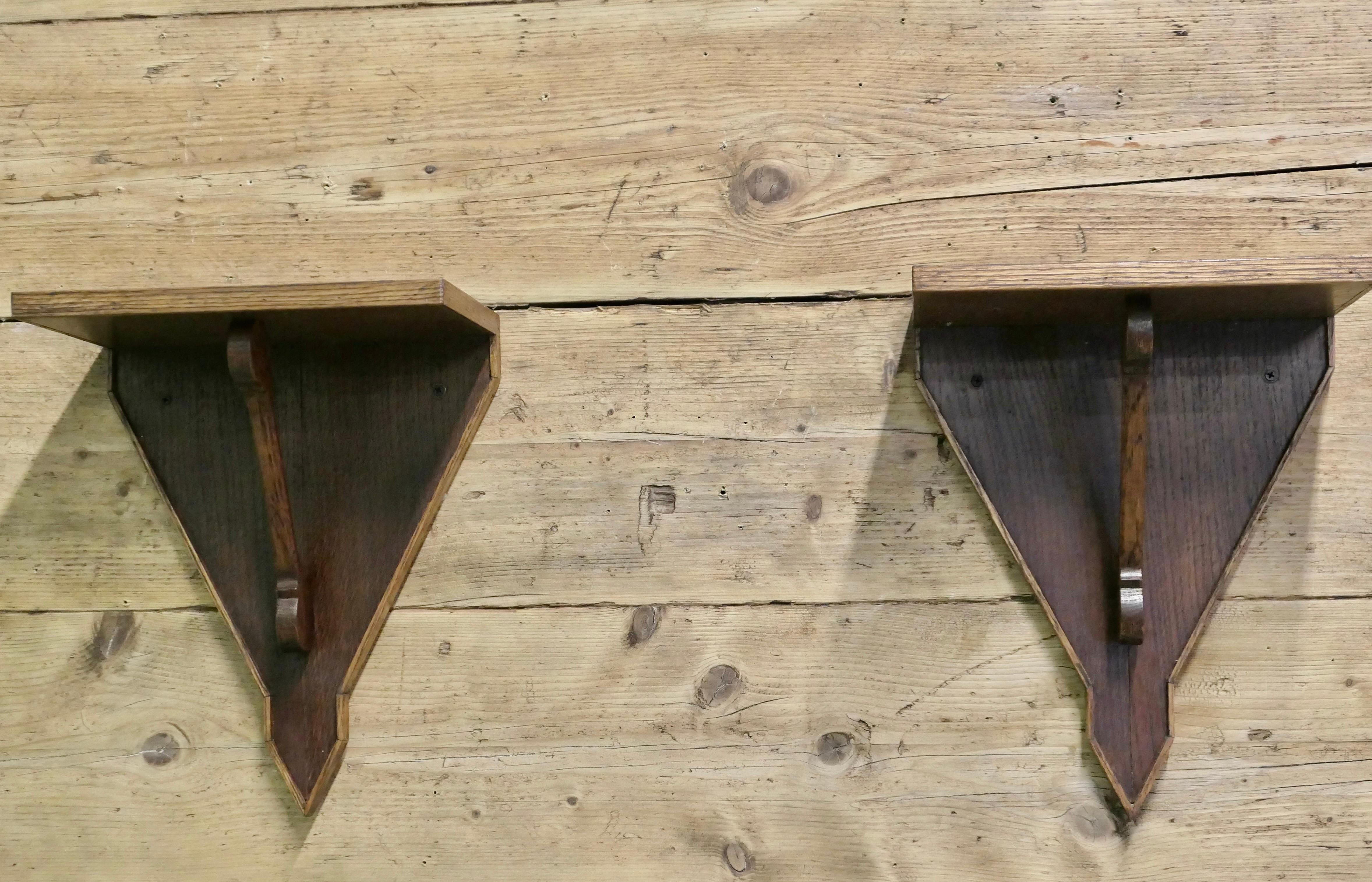 Hand Made Oak Wall Brackets

These are an unpretentious beautifully simple pair of Oak Wall Brackets, they are strong and  hand made
The Brackets are 14” tall, 11.5” wide and 7” deep
TAH150
