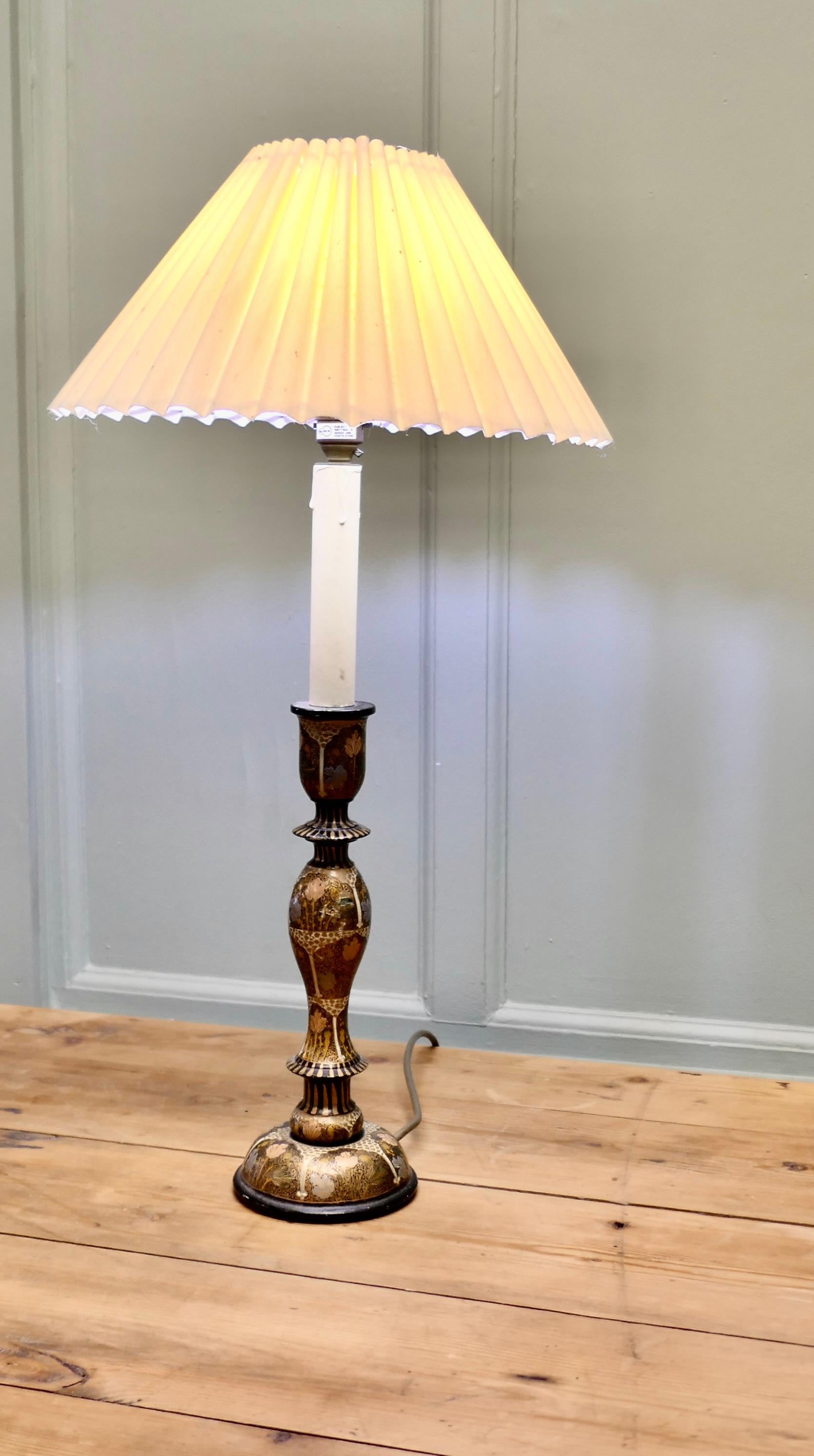 Hand Made Painted Table Lamp  


A very pretty piece, the lamp has a turned wooden candlestick base with a long simulated candle on top, the lamp is beautifully hand painted in the Islamic style, mostly in black and gold 
The lamp is all working,
