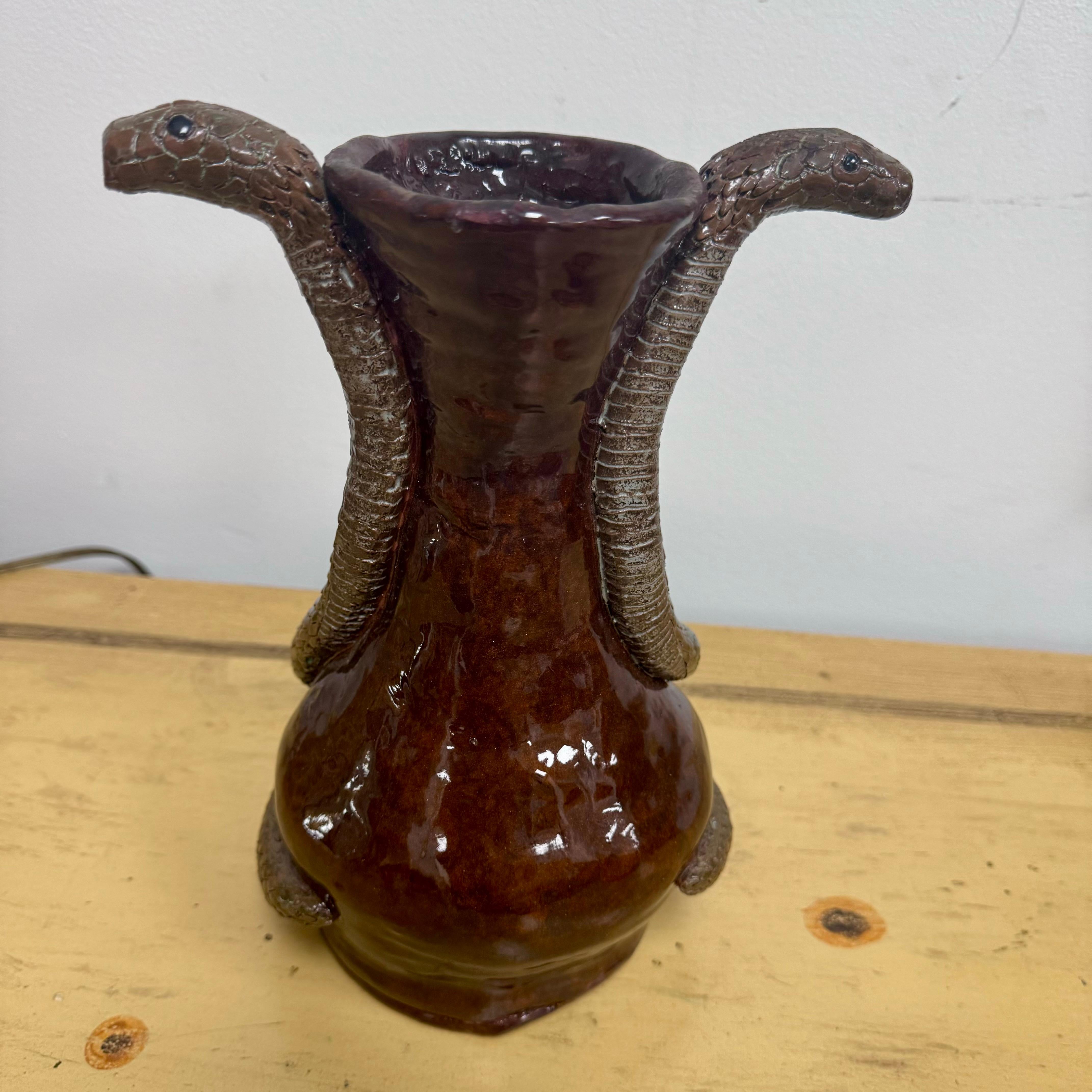 Folk art hand made double snake vase from the early 2000’s. Signed on the underside with illegible signature.  