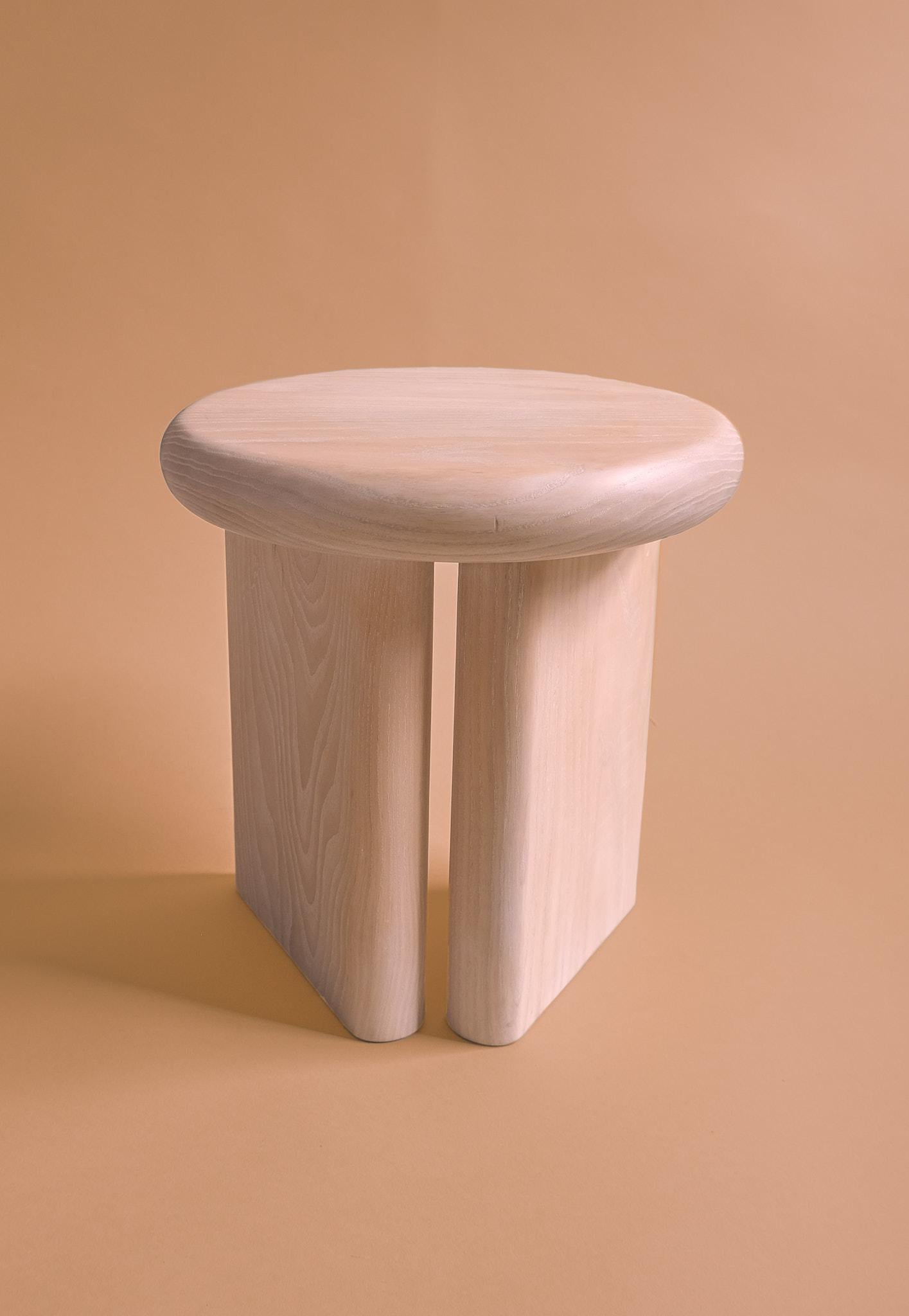 A sophisticated take on a classic three legged, or tripod, stool, the Pebble Stool’s triangular leg arrangement creates three support points from just two legs. The striking sculptural form is polished to a silky smooth finish like a pebble worn