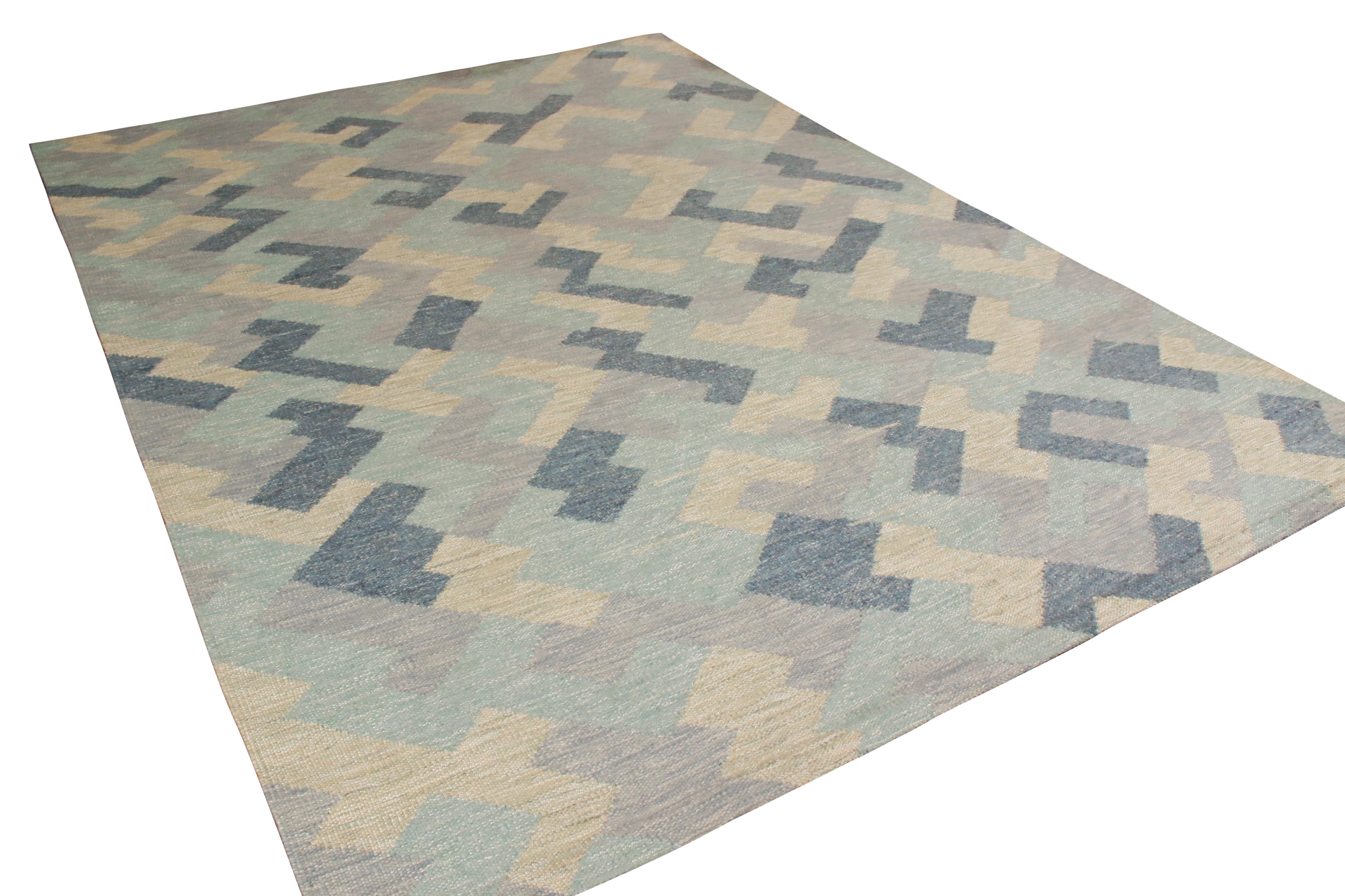 handwoven in a proprietary blend of wool and silk, this flat-weave is an 9x12 Scandinavian Kilim rug from Rug & Kilim’s award-winning Scandinavian Collection, enjoying a transitional, modern appeal in the marriage of a geometric all-over pattern
