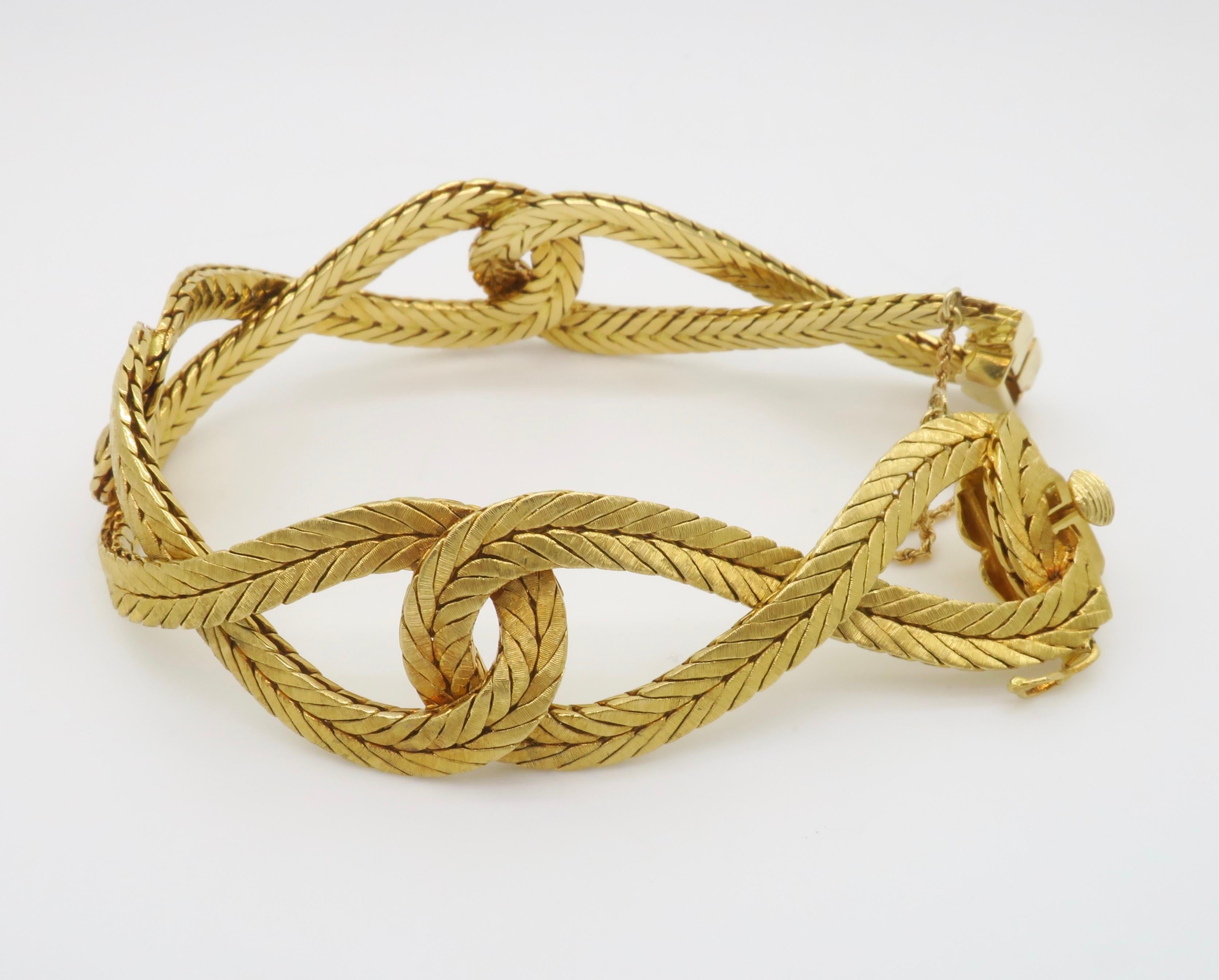 Donna Bracciale in oro 18k Hand Made, firmato, numerato, intrecciato in vendita