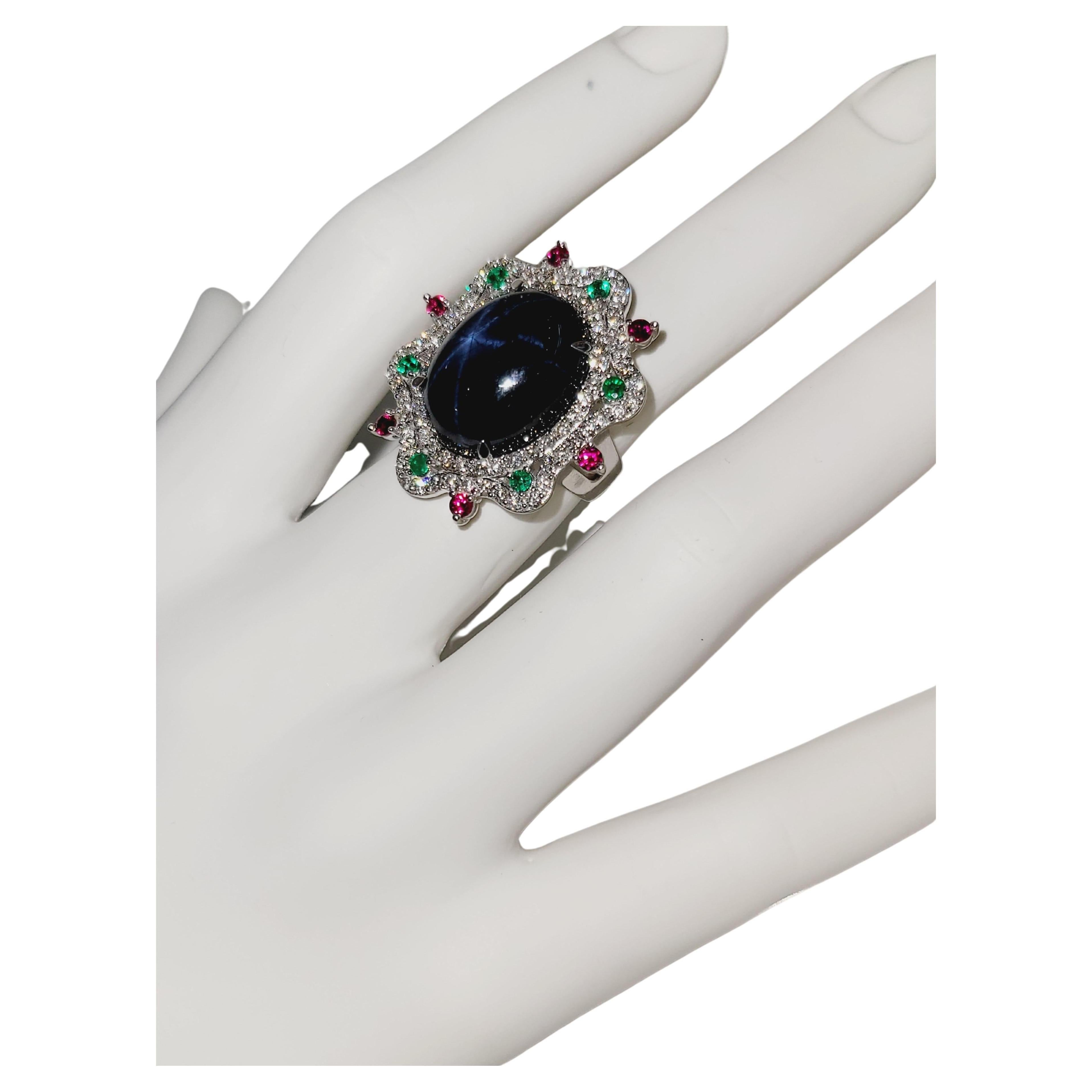 Hand Made Star Sapphire 
14K White Gold
Gender Women
Condition New
Ring Size 5.75
Main stone Sapphire star 39.00ct
Diamonds 2.45ct 
Clarity VS 
Color Grade E-F
Ruby 0.38ct
Emerald 0.32ct 
Weight 16gr
Retail $19000