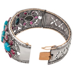 Hand Made Sterling Silver with 14k Yellow Gold Bangle with Rubuies, Turquoise