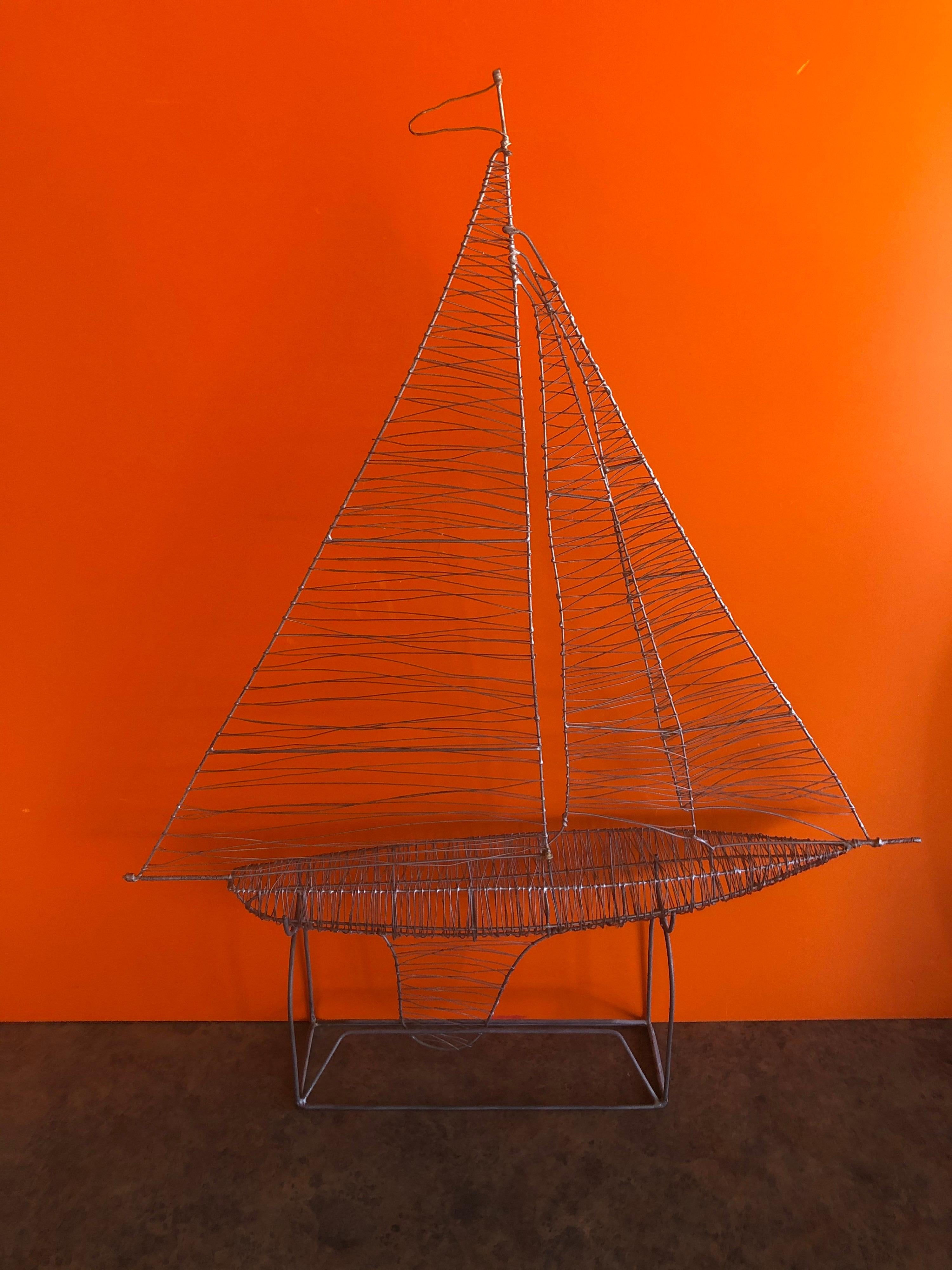 Handmade wire sailboat sculpture with stand extra large crystal sailboat sculpture by Daum, France, circa 1970s. Etched signature reads 