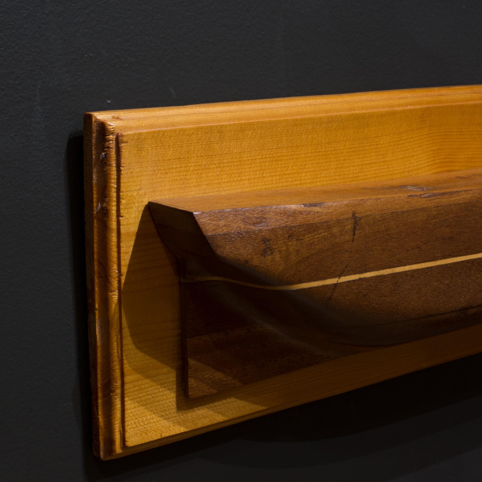ABOUT

An original hand made half hull constructed of layers of different of types of wood with a brass plaque 