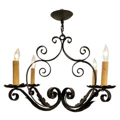 Vintage Hand-Made Wrought Iron 4 Light Chandelier.
