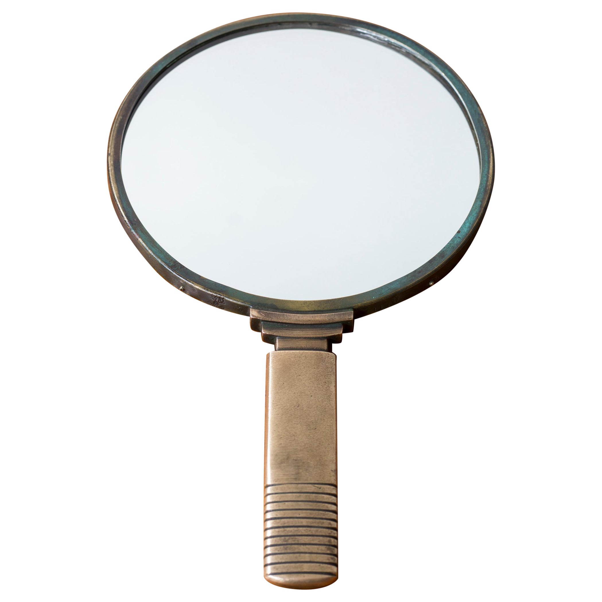 Hand mirror in bronze by GAB For Sale