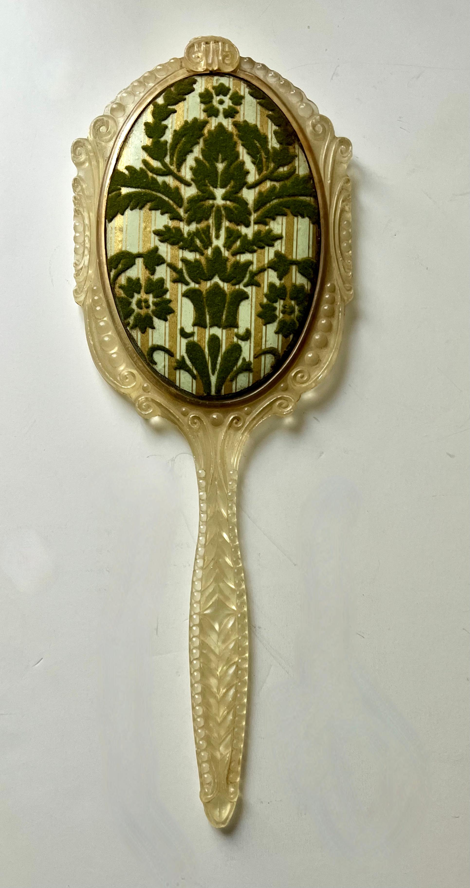 Victorian Hand Mirror with Ornate Plastic Frame and Cut Velvet Decorative Backing For Sale