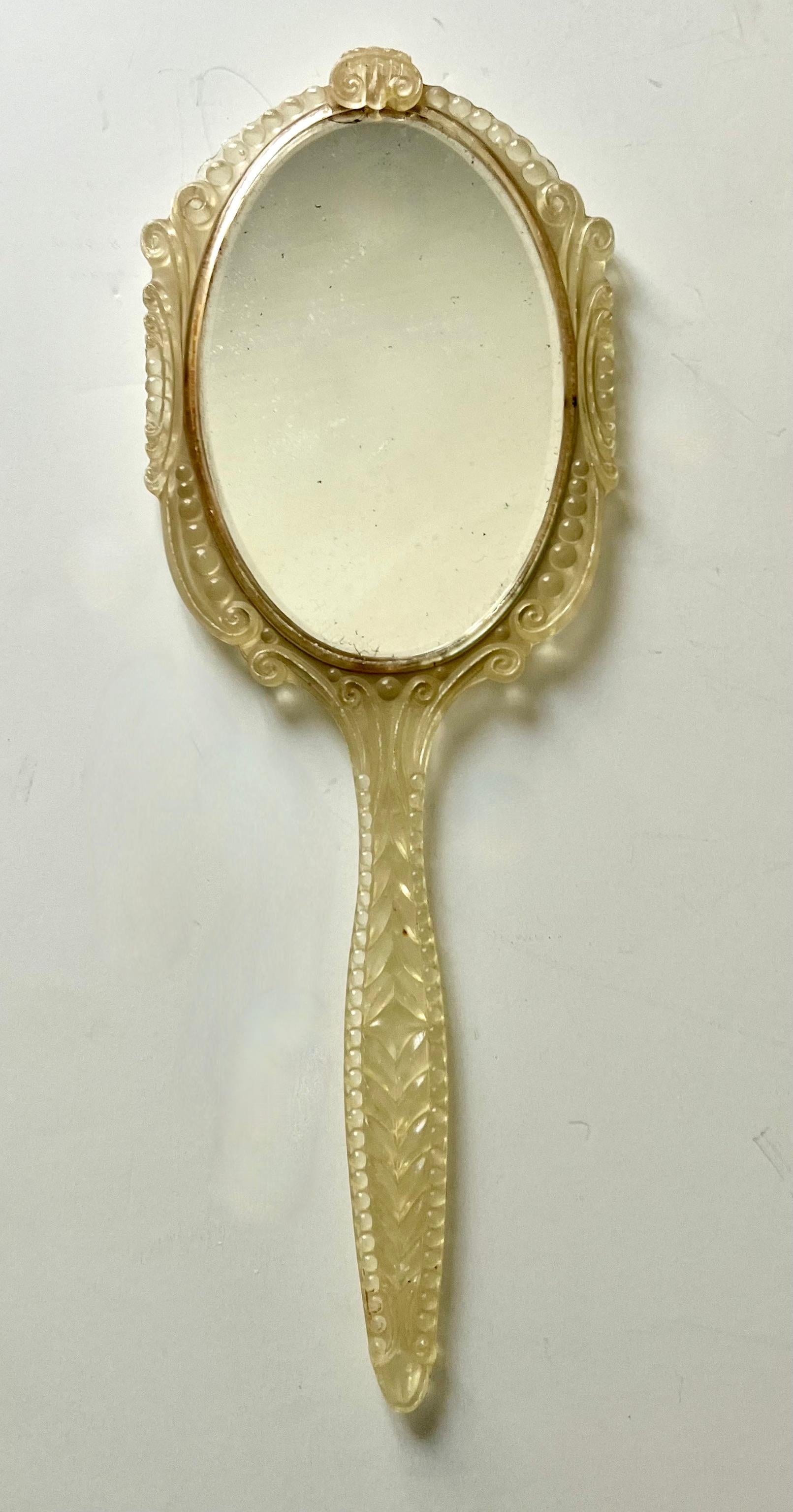 Hand Mirror with Ornate Plastic Frame and Cut Velvet Decorative Backing In Good Condition For Sale In Los Angeles, CA