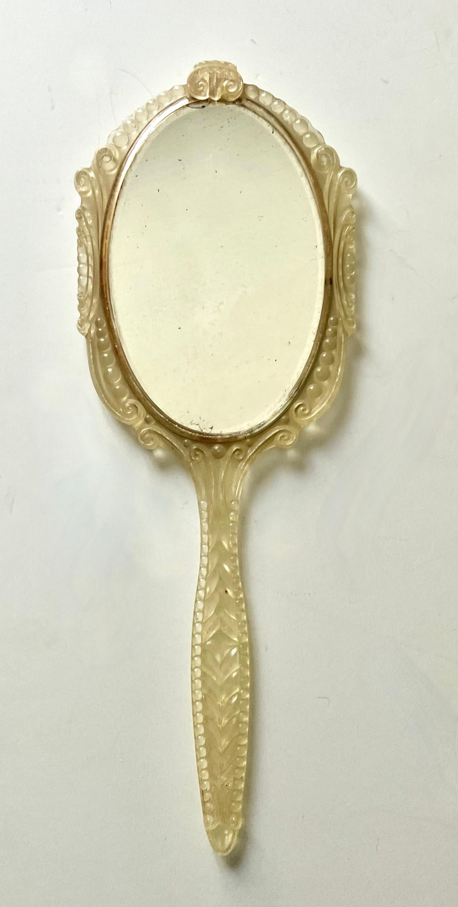 20th Century Hand Mirror with Ornate Plastic Frame and Cut Velvet Decorative Backing For Sale