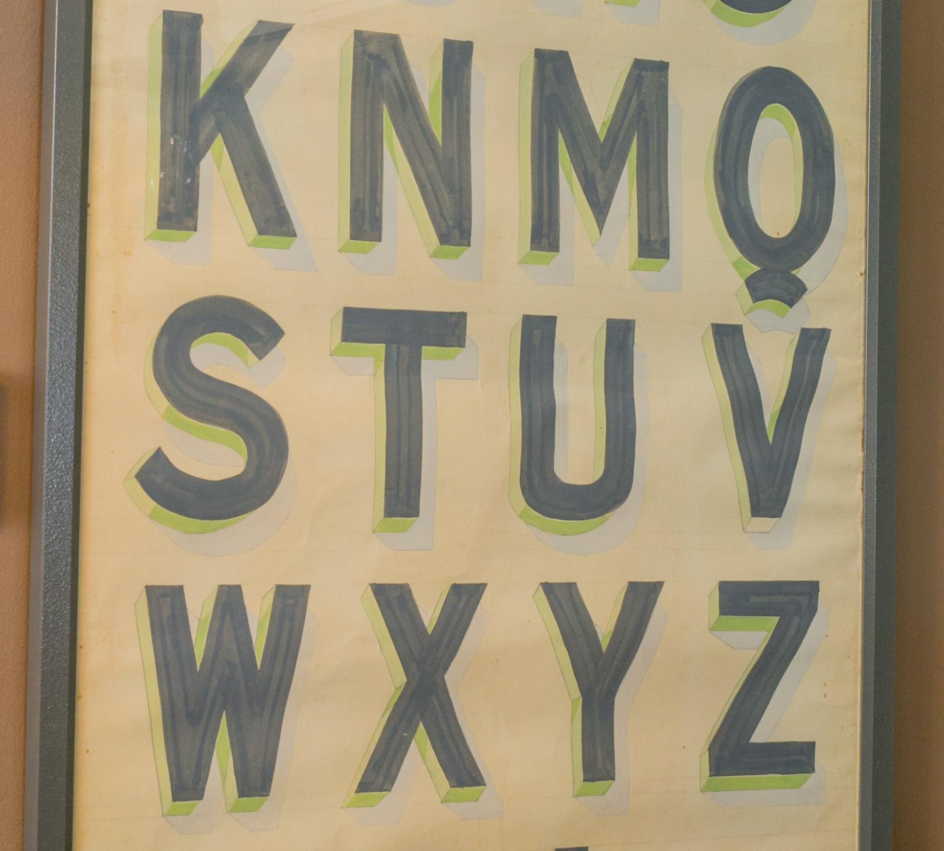 Hand painted alphabet chart by a Belgian artist in the 1920s (paint on canvas). Coomans was a commercial artist specializing in graphic art, who developed his own unique lettering styles. This extremely decorative chart is newly backed and framed.