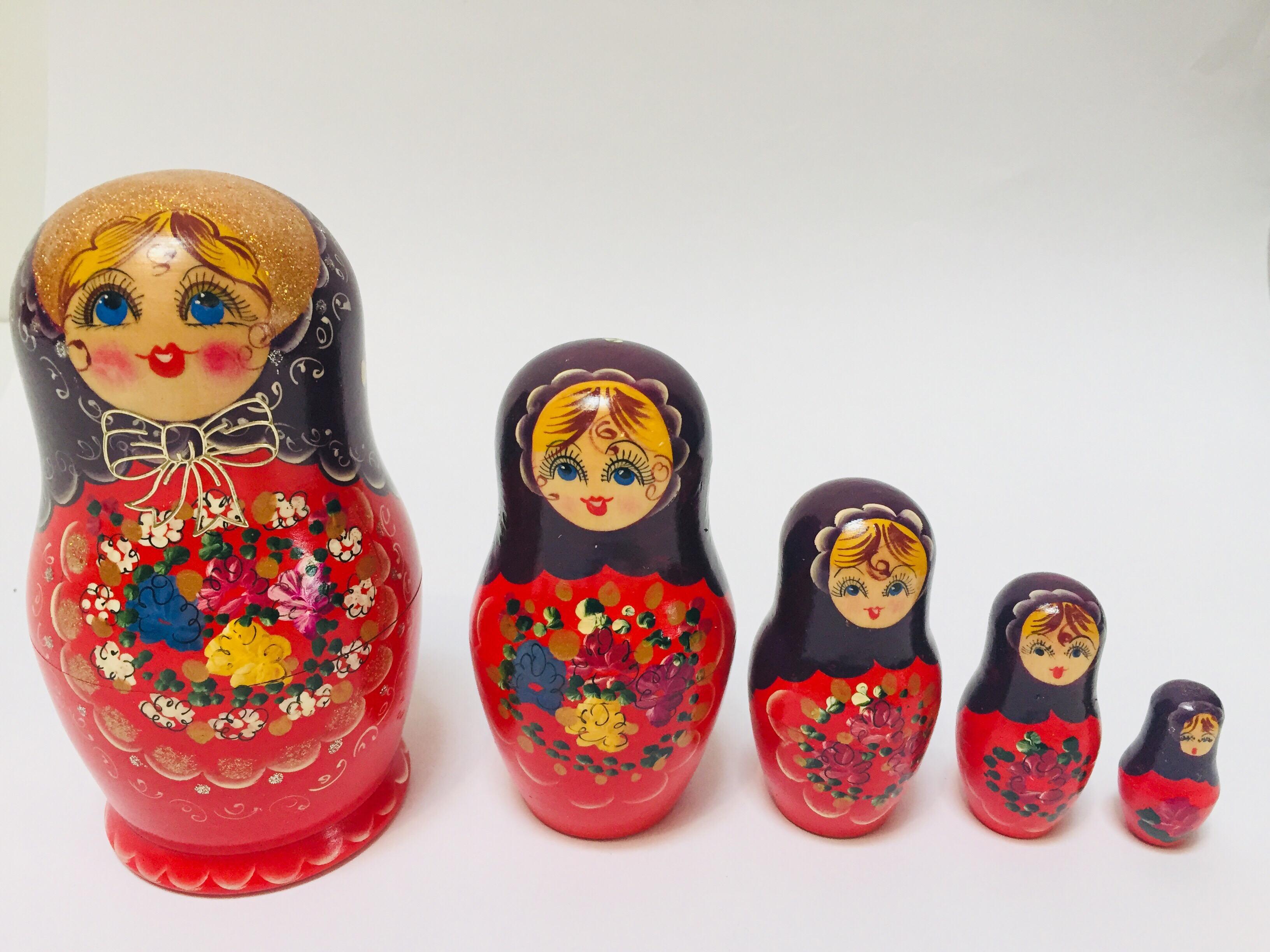 20th Century Hand Painted and Carved Nesting Matryoshka Russian Dolls