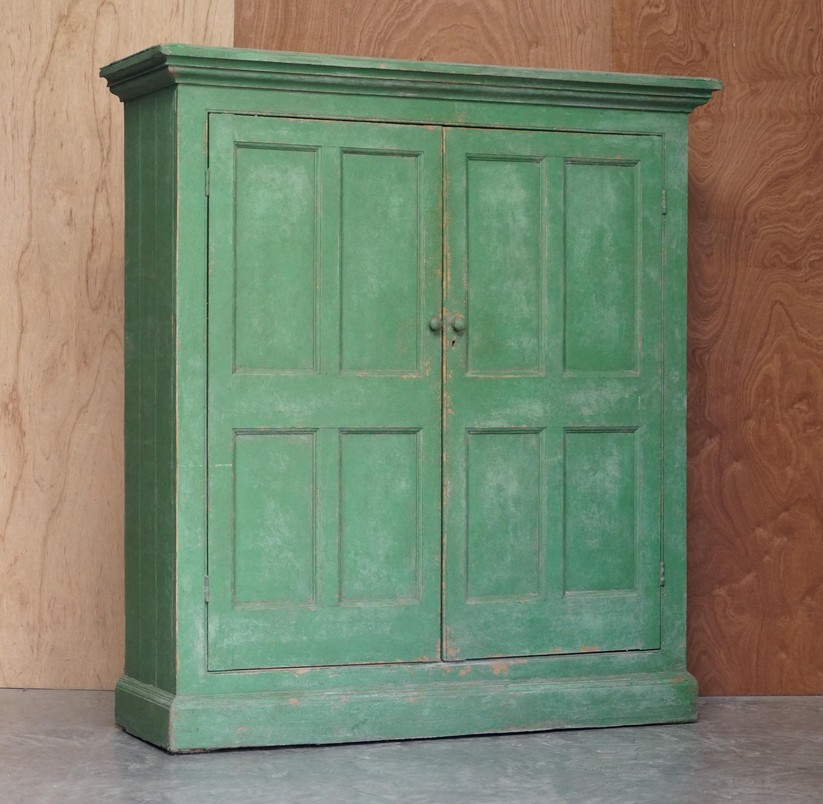 We are delighted to offer for sale this stunning highly collectable hand painted pea green Victorian pine housekeepers cupboard for linens or pots

A very charming and highly collectable piece, the painting is beautifully aged and looks sublime in