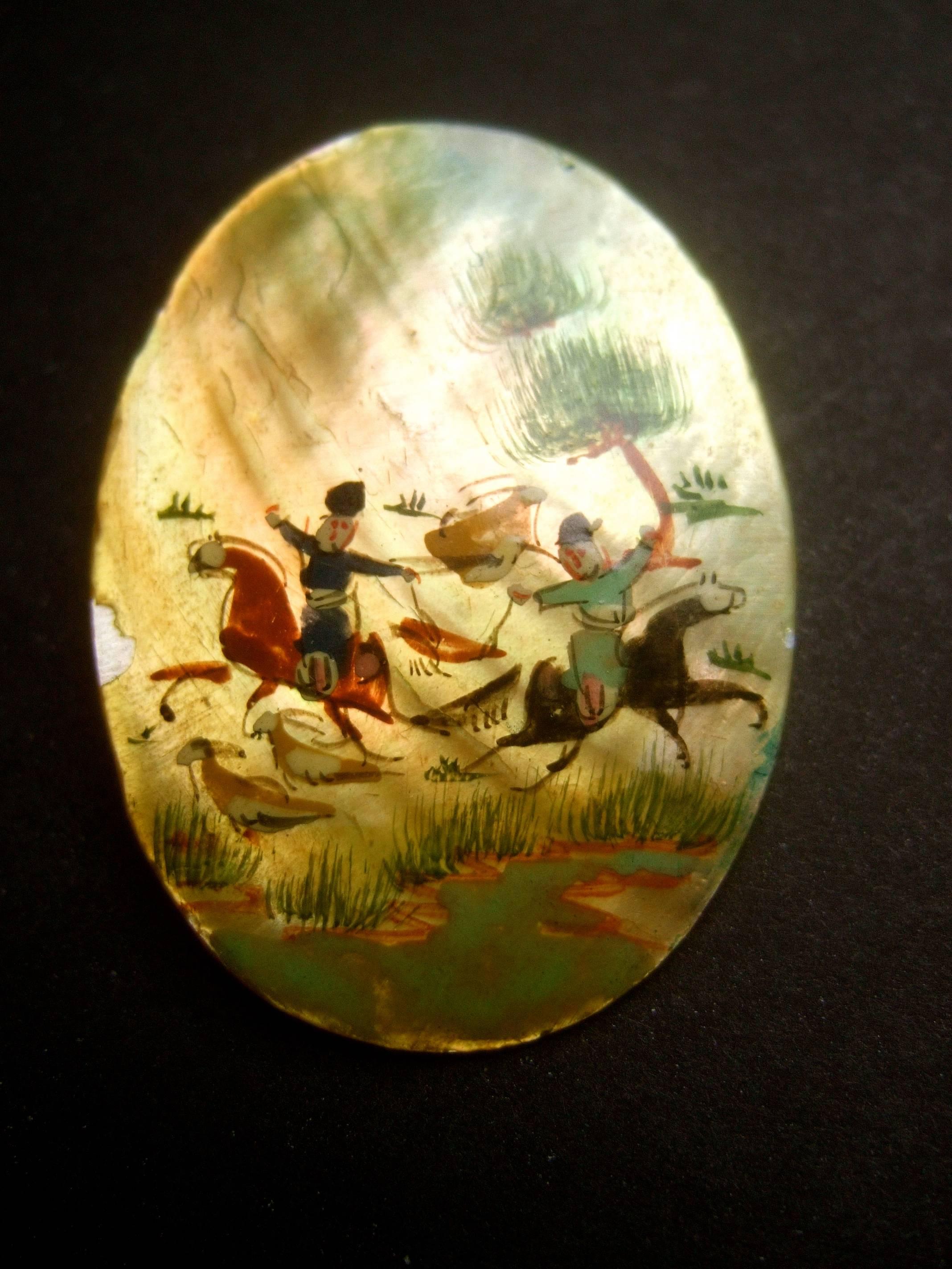 Women's Hand Painted Artisan Mother of Pearl Warrior Scene Brooch c 1960 For Sale