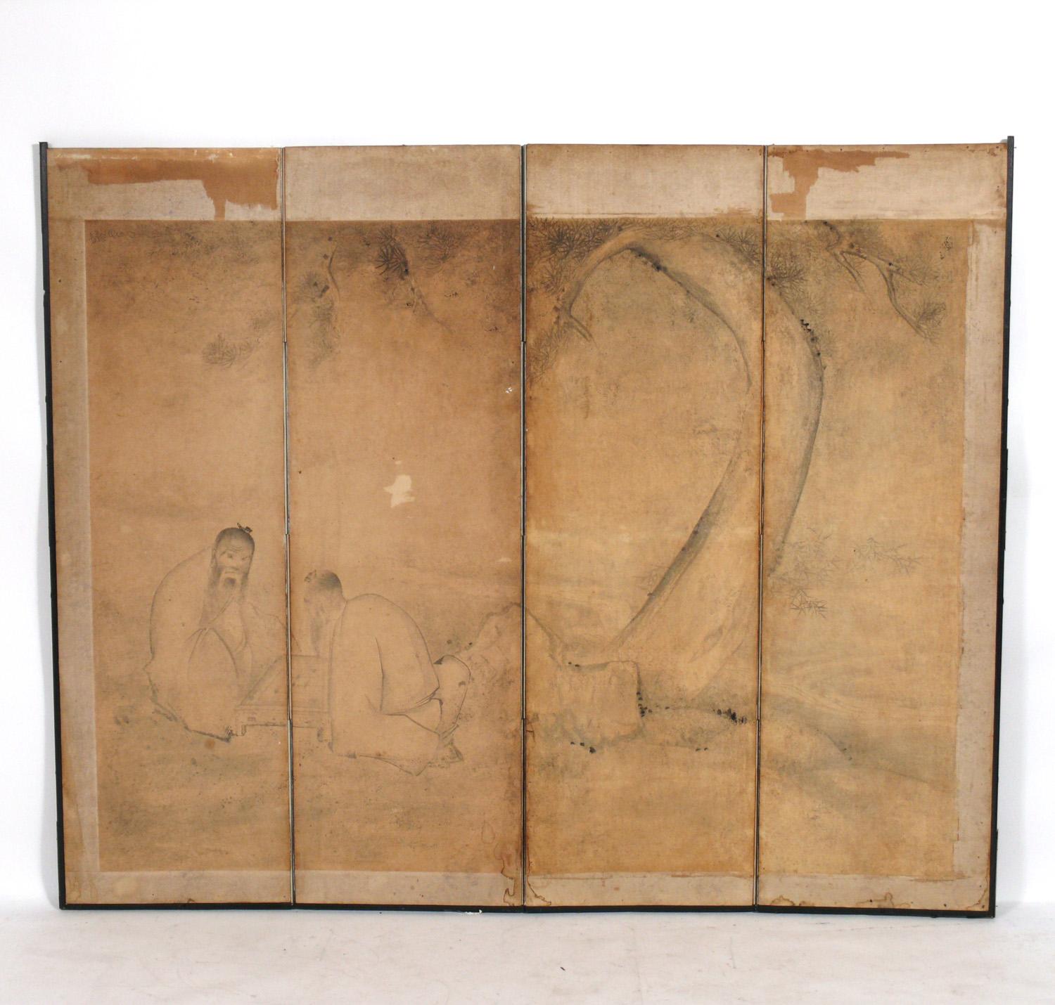 Hand painted Asian folding screen, probably Chinese, believed to be circa 1950s, possibly much earlier. It depicts two scholars playing a game under a flowing tree. As you can see from the photos, there is much wear to the screen, incluidng water