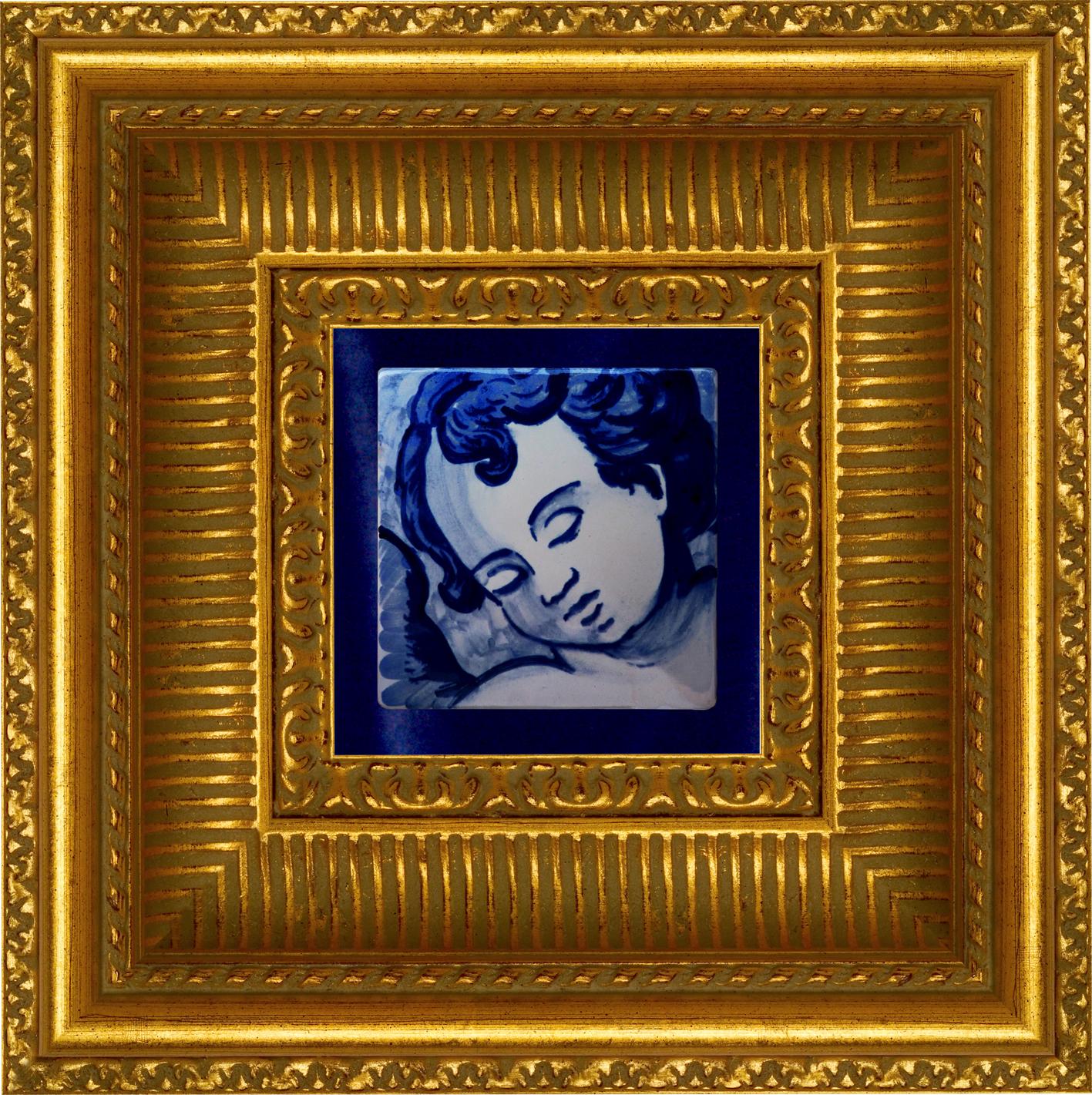 Gorgeous blue hand painted Baroque cherub or angel 18th century style Portuguese ceramic tile/azulejo
The tile painted in cobalt blue over white in typical 18th century Portugal set the taste for monumental ceramic tile applications in churches and