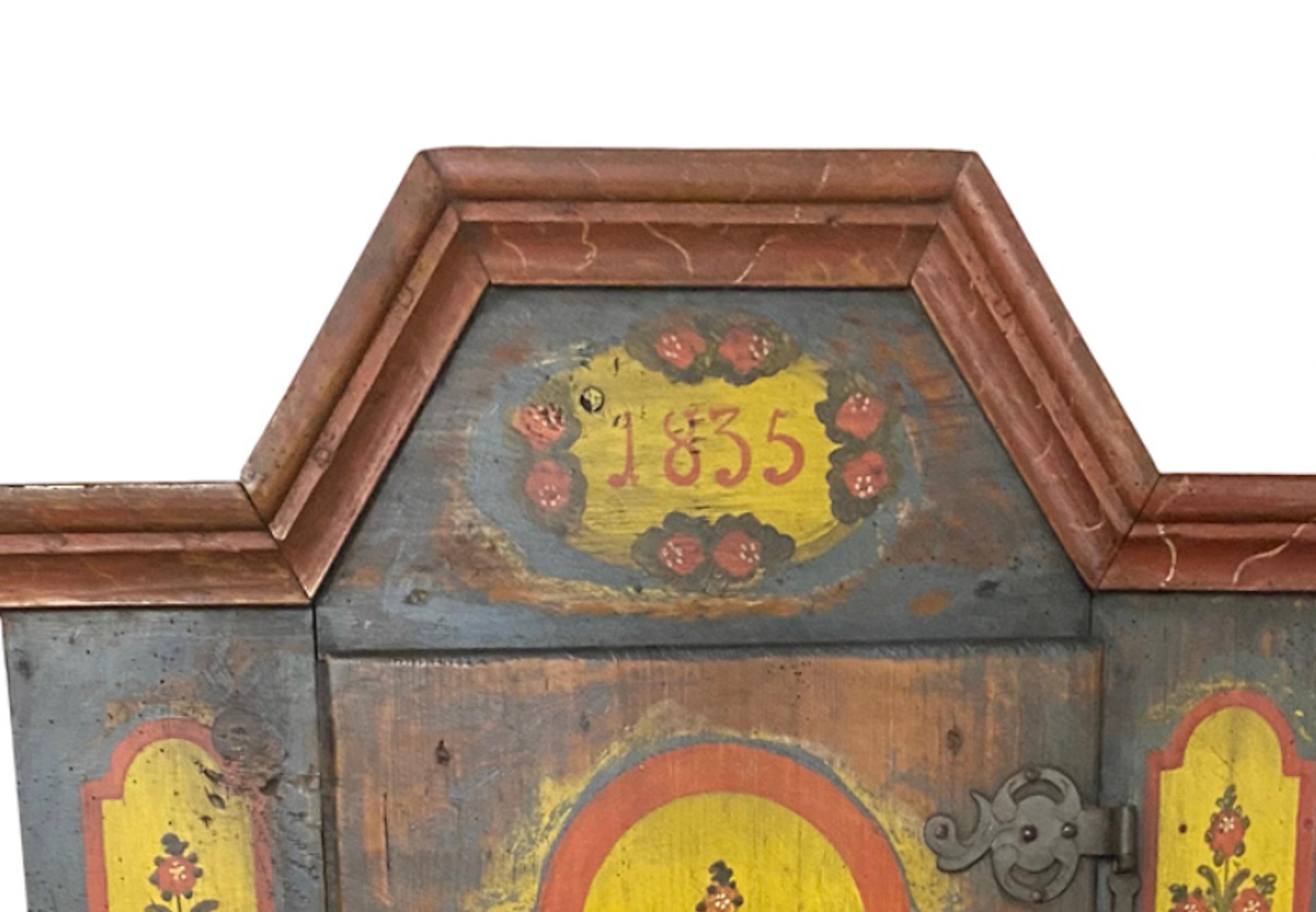 Hand painted blue cupboard with flowers and red cornice

Dated “1835”

Part of a pair but can be sold individually

70.5″H x 31″W x 16″D