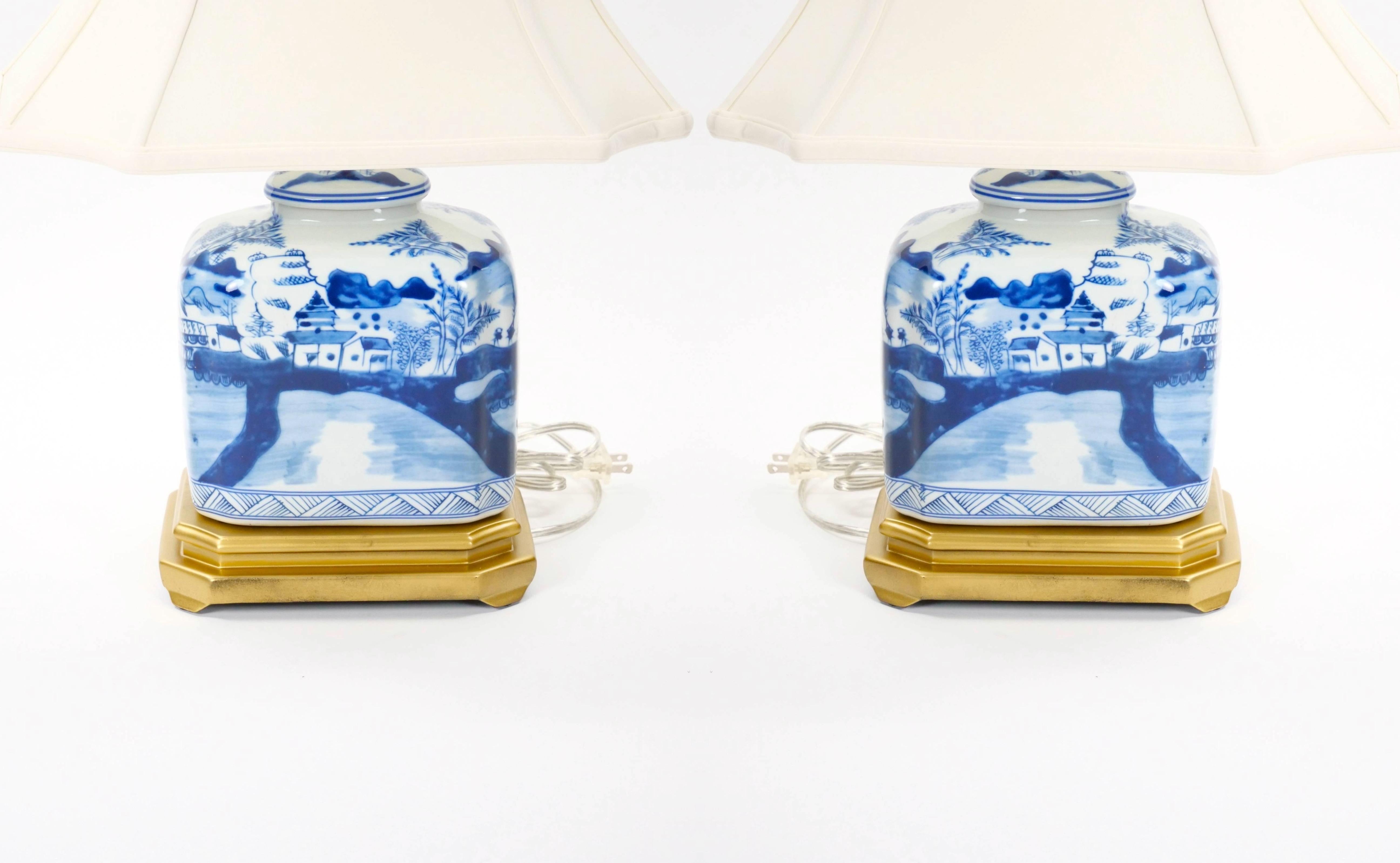 20th Century Hand Painted Blue & White Porcelain Table Lamps / Gilt Wood Painted Base For Sale