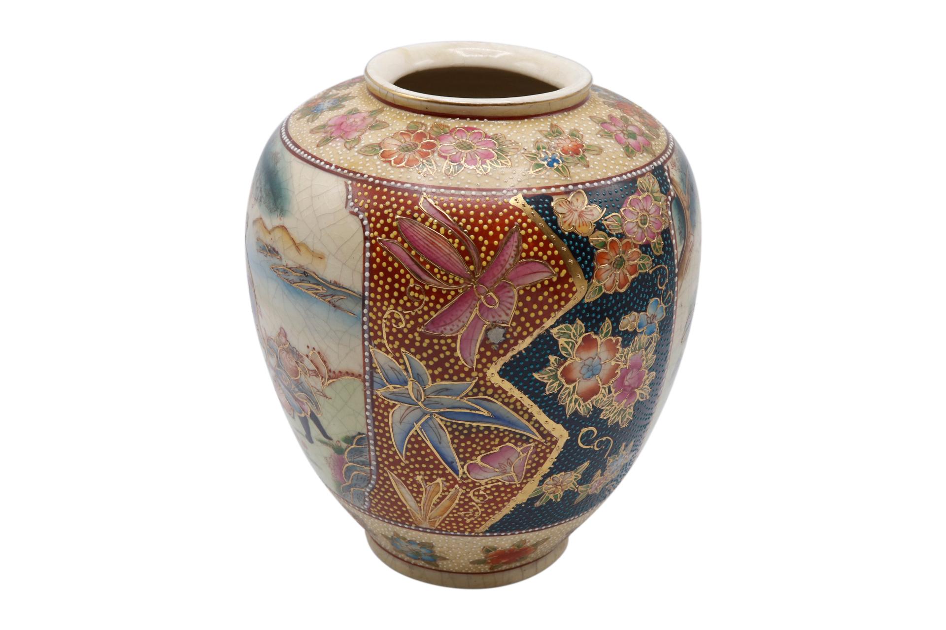 A hand painted ceramic Chinese vase. Both sides show the same scene, a Yuenü or swordswoman on horseback. Framed with blossom outlined in gold surround with gold dots. Marked underneath “Made in China”.