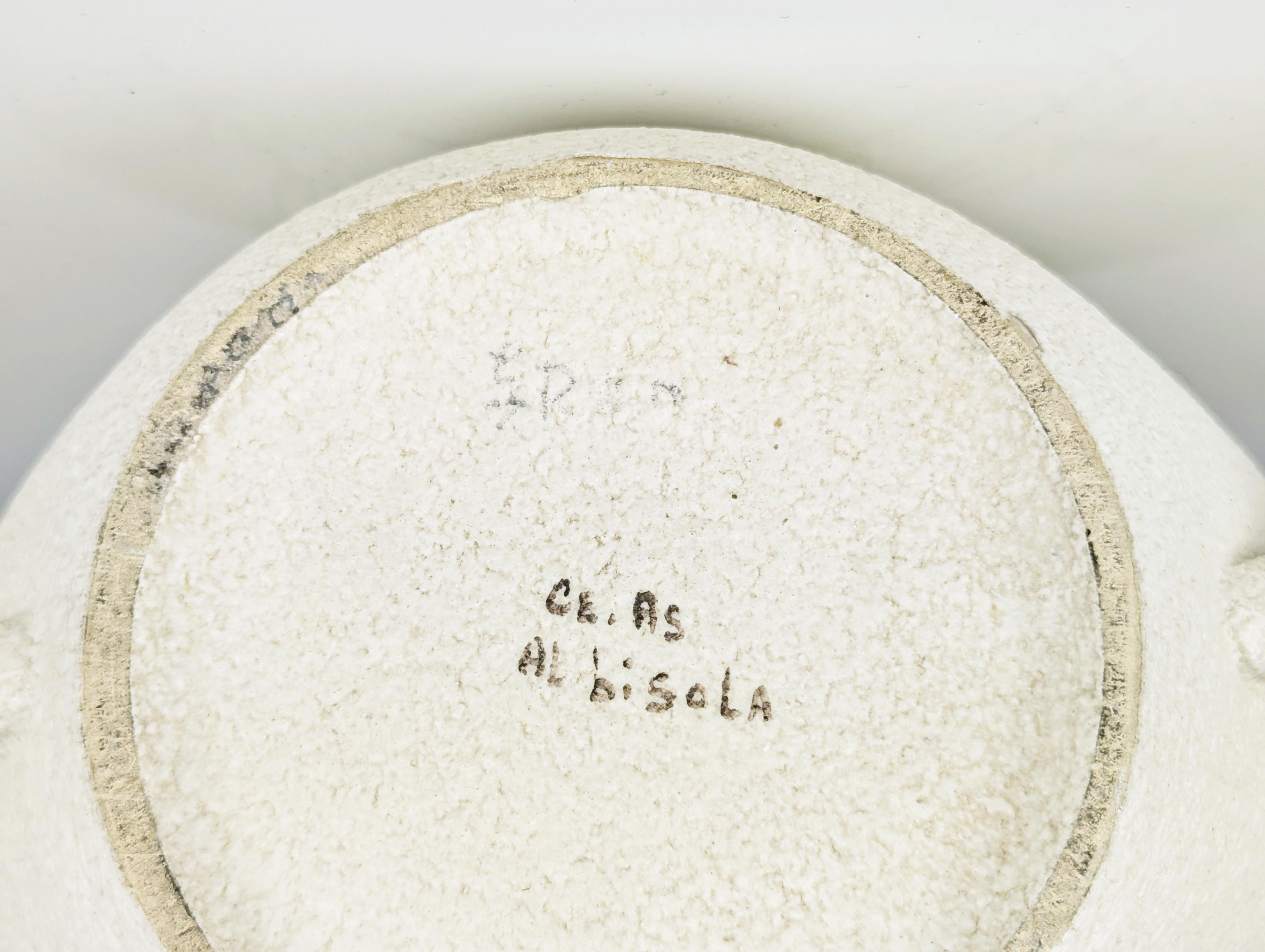 handmade ceramic vase, produced in Italy between the late 1940s and early 1950s by the prestigious ceramic factory CE AS of Albisola, Italy.
The vase is hand-decorated on both sides by decorator Lina Poggi Assalini who worked at the factory from its