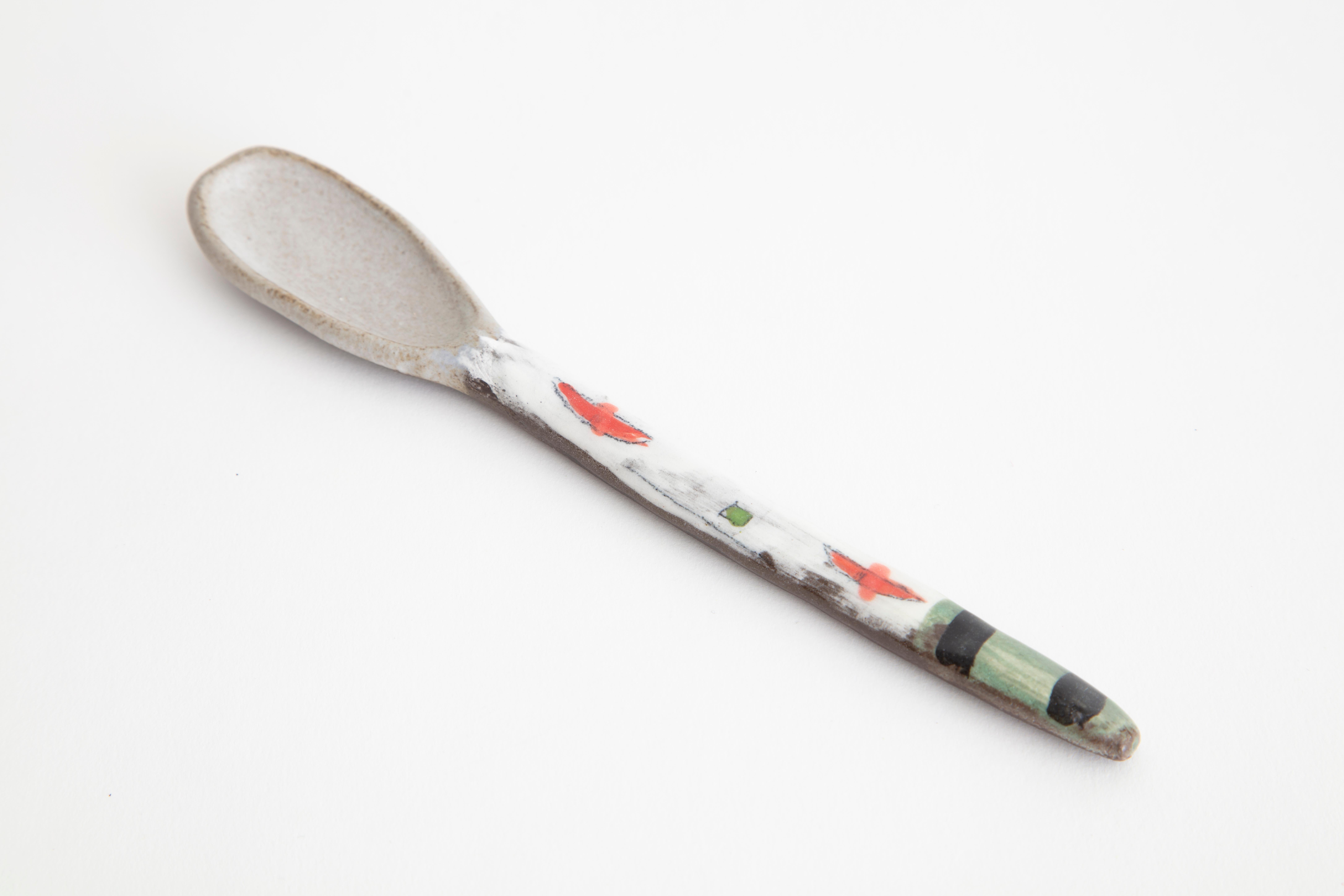 Part of the surrealist-inspired show the dinner guests, each ceramic smiley spoon is hand painted with anthropomorphic shapes and playful, brightly-colored patterns. 1 of 9.

Handmade by Shino Takeda
Materials: Hand painted ceramic
Dimensions: H