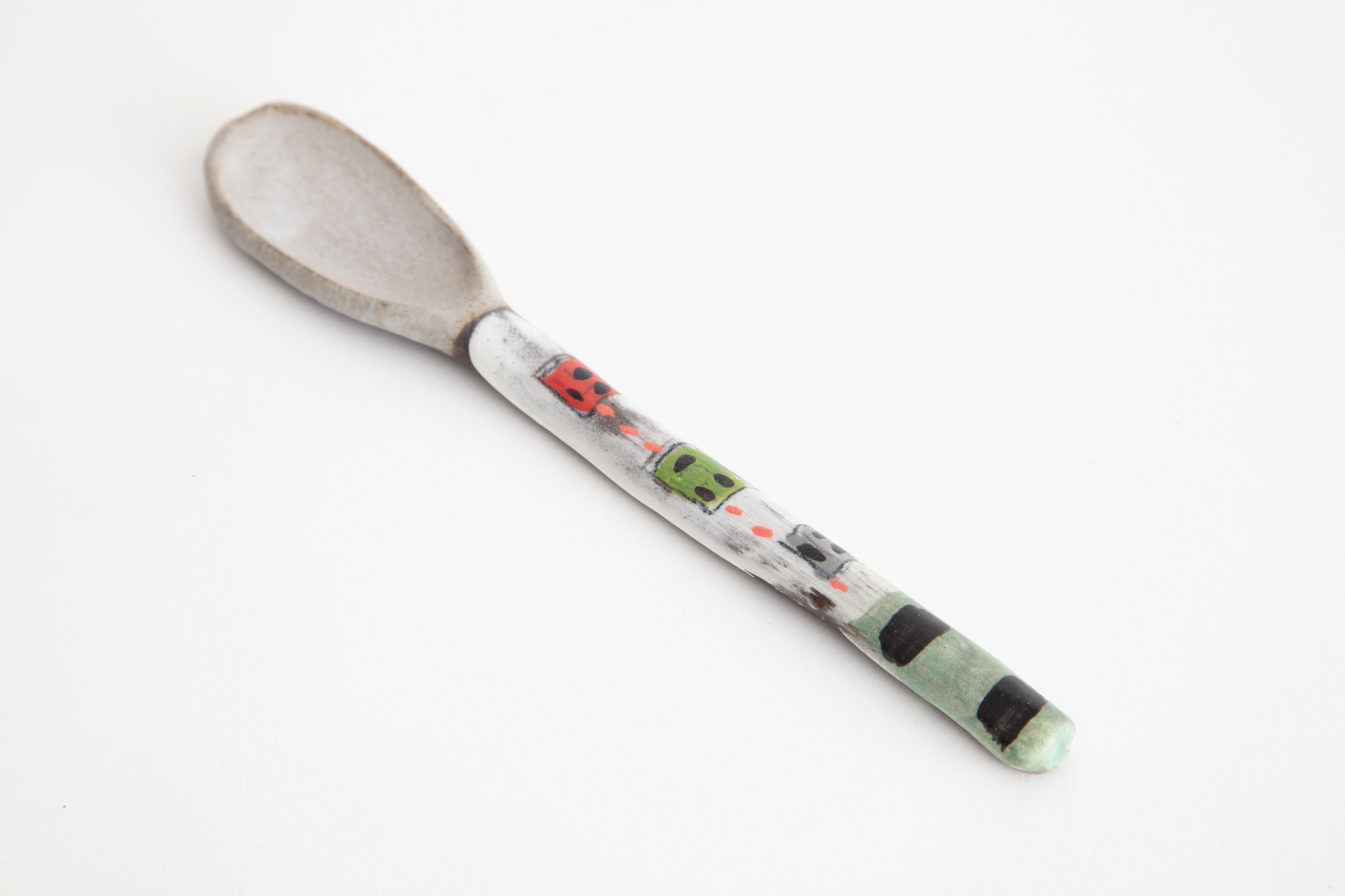 Part of the Surrealist-inspired show The Dinner Guests, each ceramic Smiley Spoon is hand painted with anthropomorphic shapes and playful, brightly-colored patterns. 1 of 9.

Handmade by Shino Takeda
Materials: Hand painted ceramic
Dimensions: H
