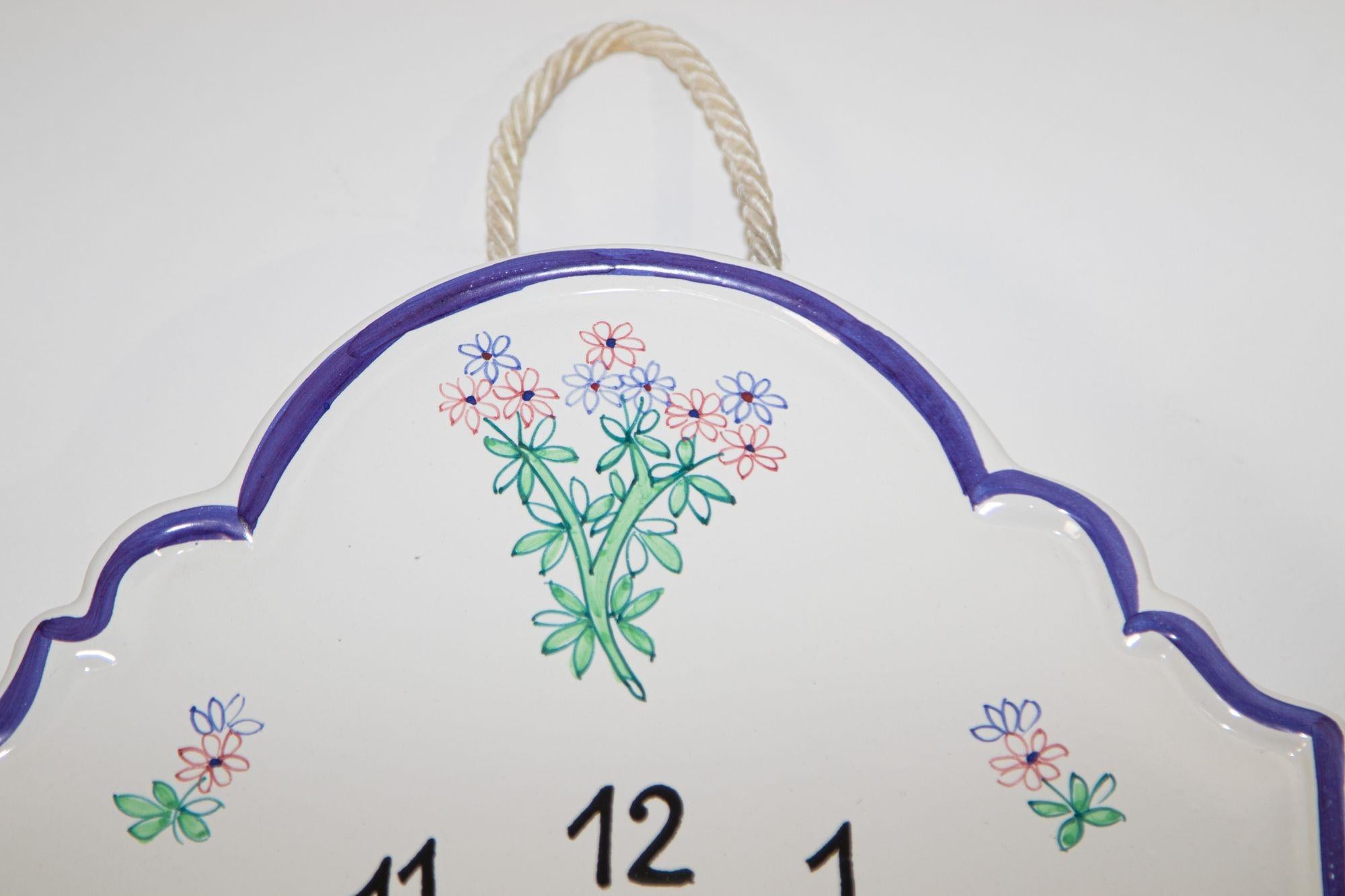 Hand painted ceramic wall clock with Thymus design.
By Fratelli Mari in Deruta, Italy.
Beautiful hand painted wall clock with floral thyme flowers. Perfect for your cottage country farmhouse home decor.
The Fratelli Mari Company was founded in