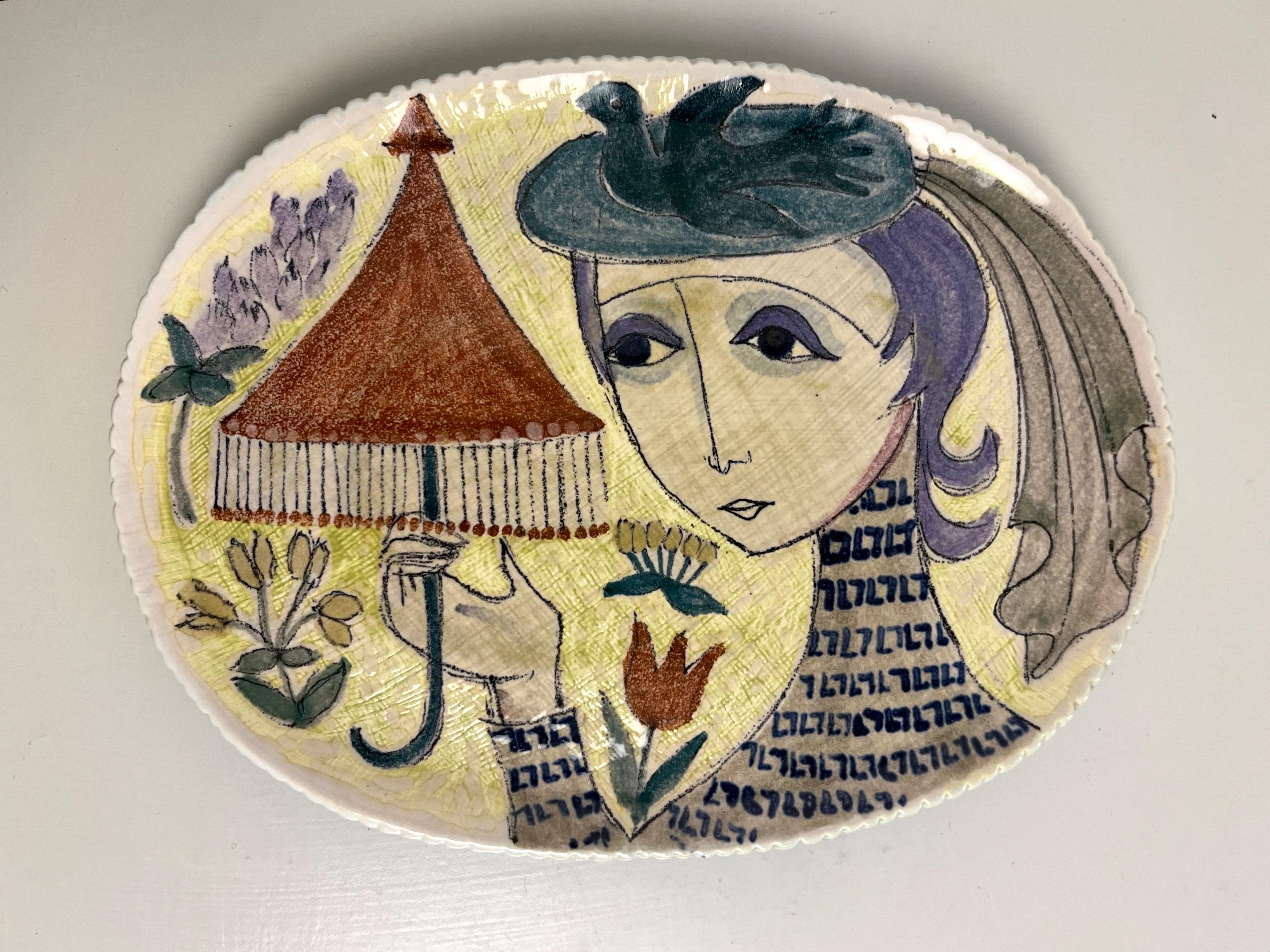 Hand-Painted Ceramic Wall Plaque by Hilkka-Liisa Ahola for Arabia, Finland, 1950s

Charming oval ceramic wall plaque designed by Finnish artist Hilkka-Liisa Ahola for Arabia, Finland from the 1950s. A wonderful example of Scandinavian modernist