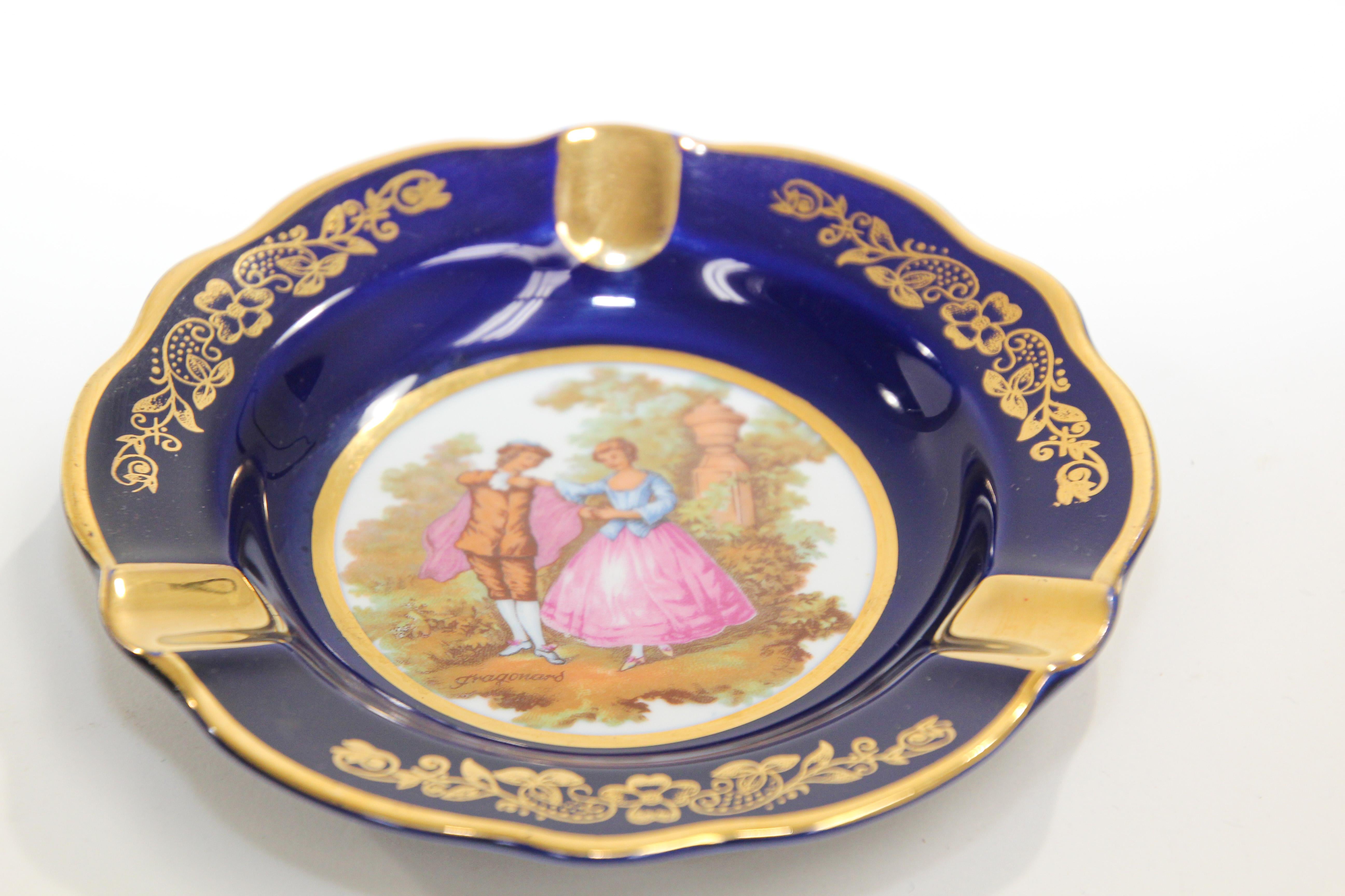 Vintage Limoges France porcelain round ashtray cobalt blue and gold.
Elegant precious porcelain ashtray hand painted with a scene of a couple in the style of French artist Fragonard.
Use it as an ashtray or for decorative accent dish.
Limoges