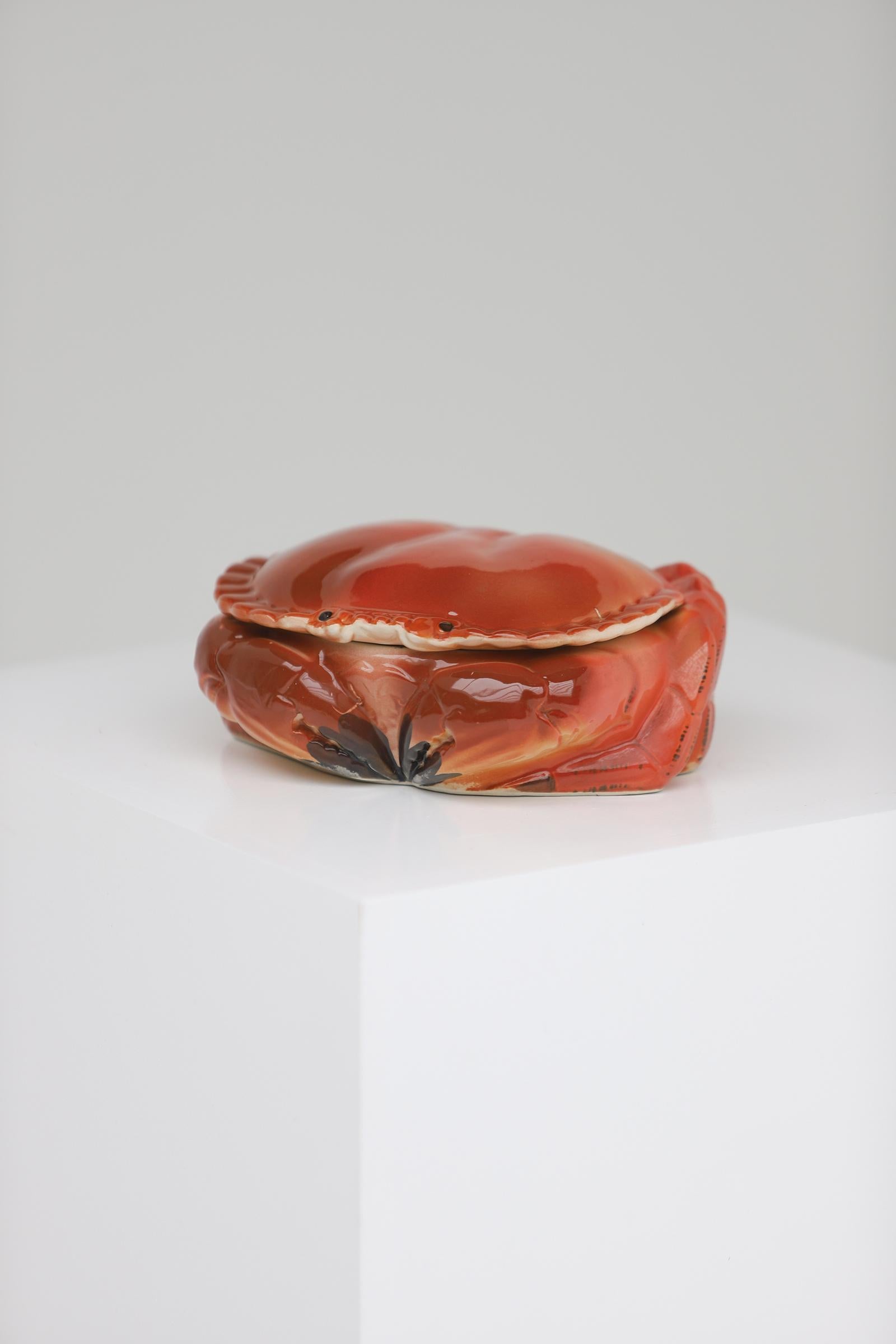 Handpainted crab terrine by Michel Caugant dating from the 1950s.
Michel Caugant was the son of a French pâté maker, he designed terrines for his father's factory. The terrine was manufactured by Herberstein, Portugal.
Signed 