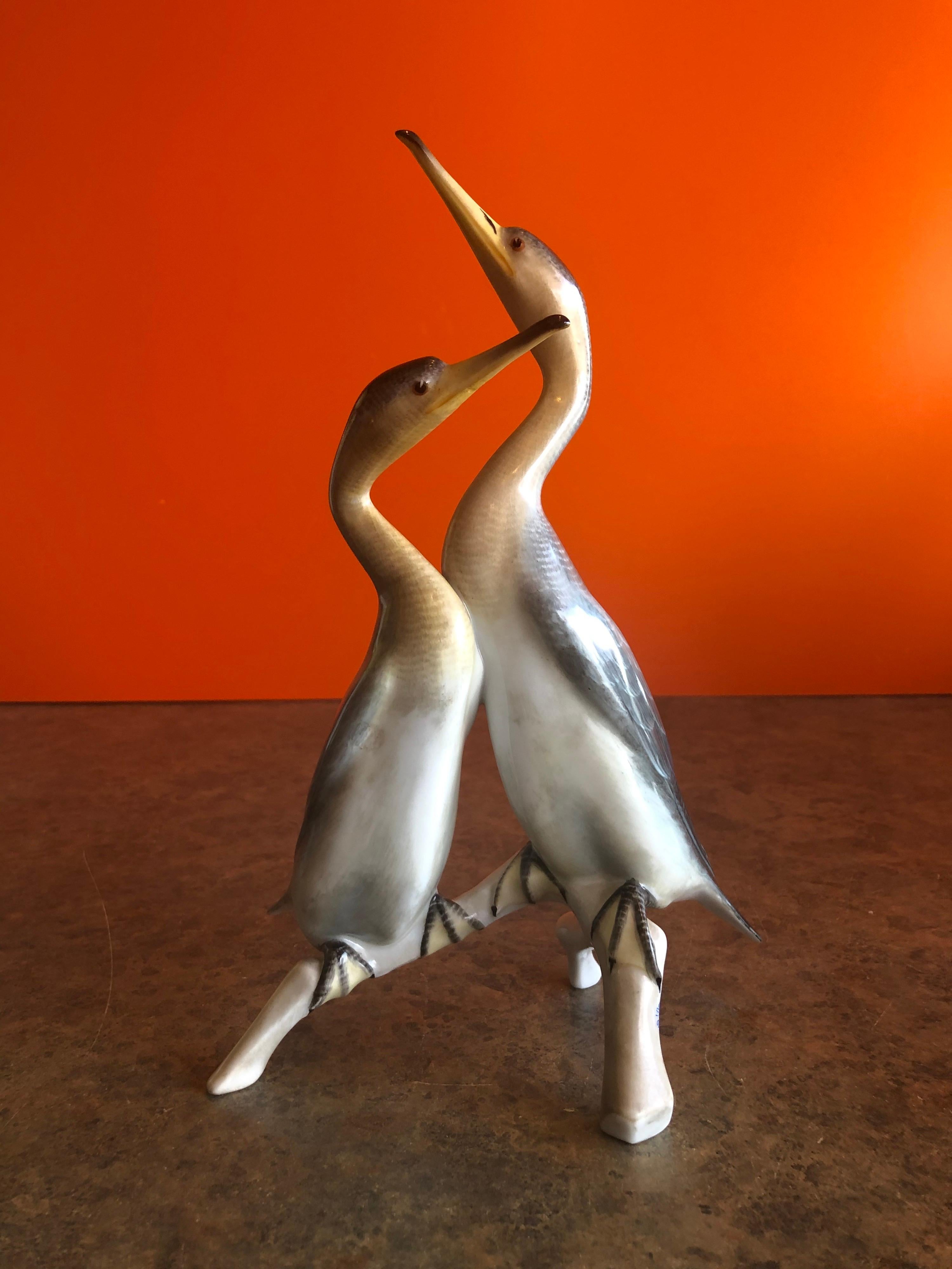 Stunning hand painted cranes / herons / birds sculpture by Herend of Hungry, circa 1970s. The piece is in very good condition with no chips, cracks or crazing. Wonderful color and detail on this piece: extremely realistic!