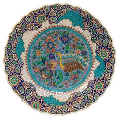 Piatto decorativo dipinto a mano secondo un disegno originale di Iznik del XVI secolo.