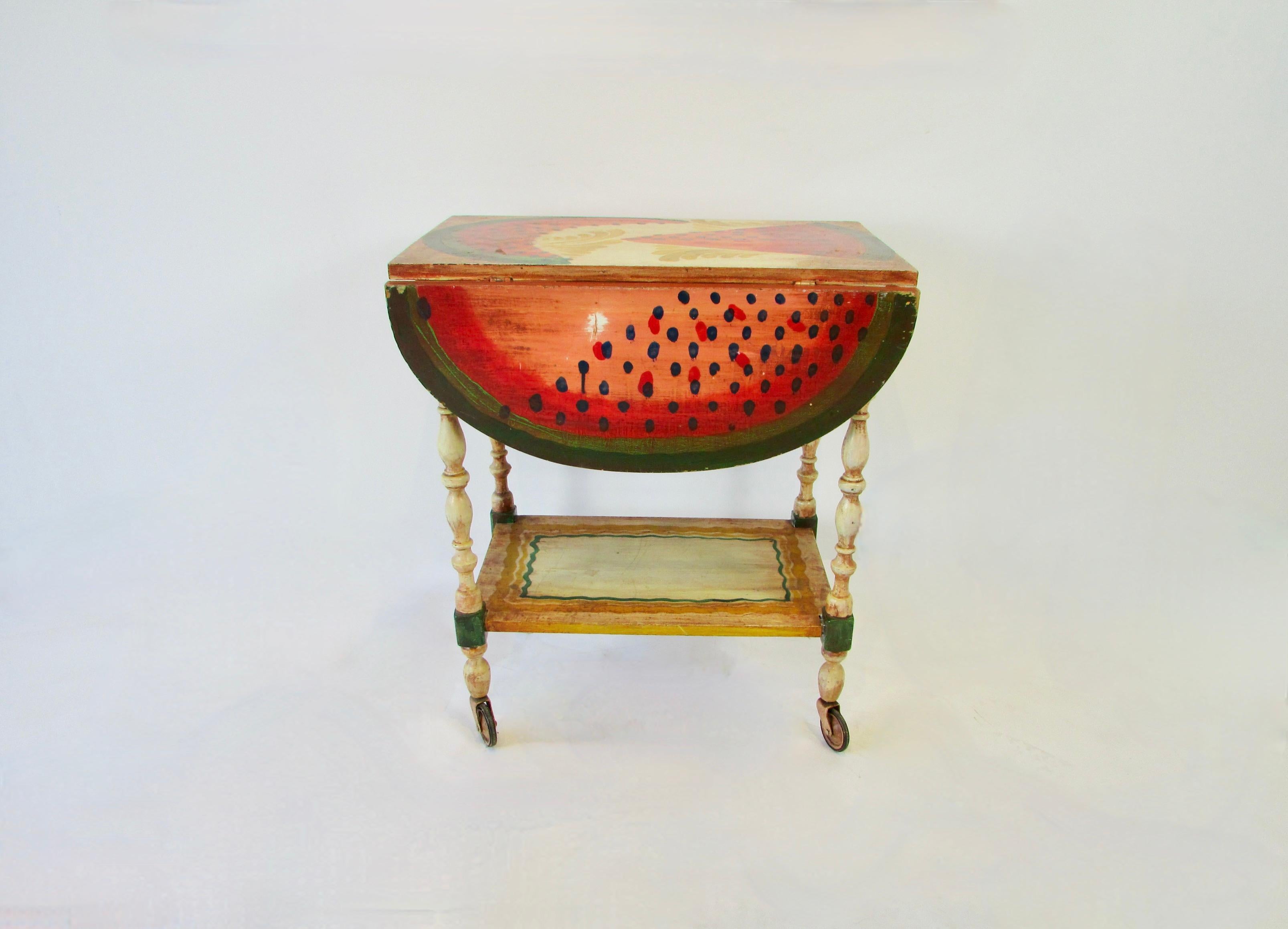 Drop leaf tea or serving cart from the shop of Peter Hunt . While this piece is not signed it is clearly the work of his shop . I purchased from the estate of a Peter Hunt collector along with a few other Hunt pieces . Drop leaves are 9 and 7/8