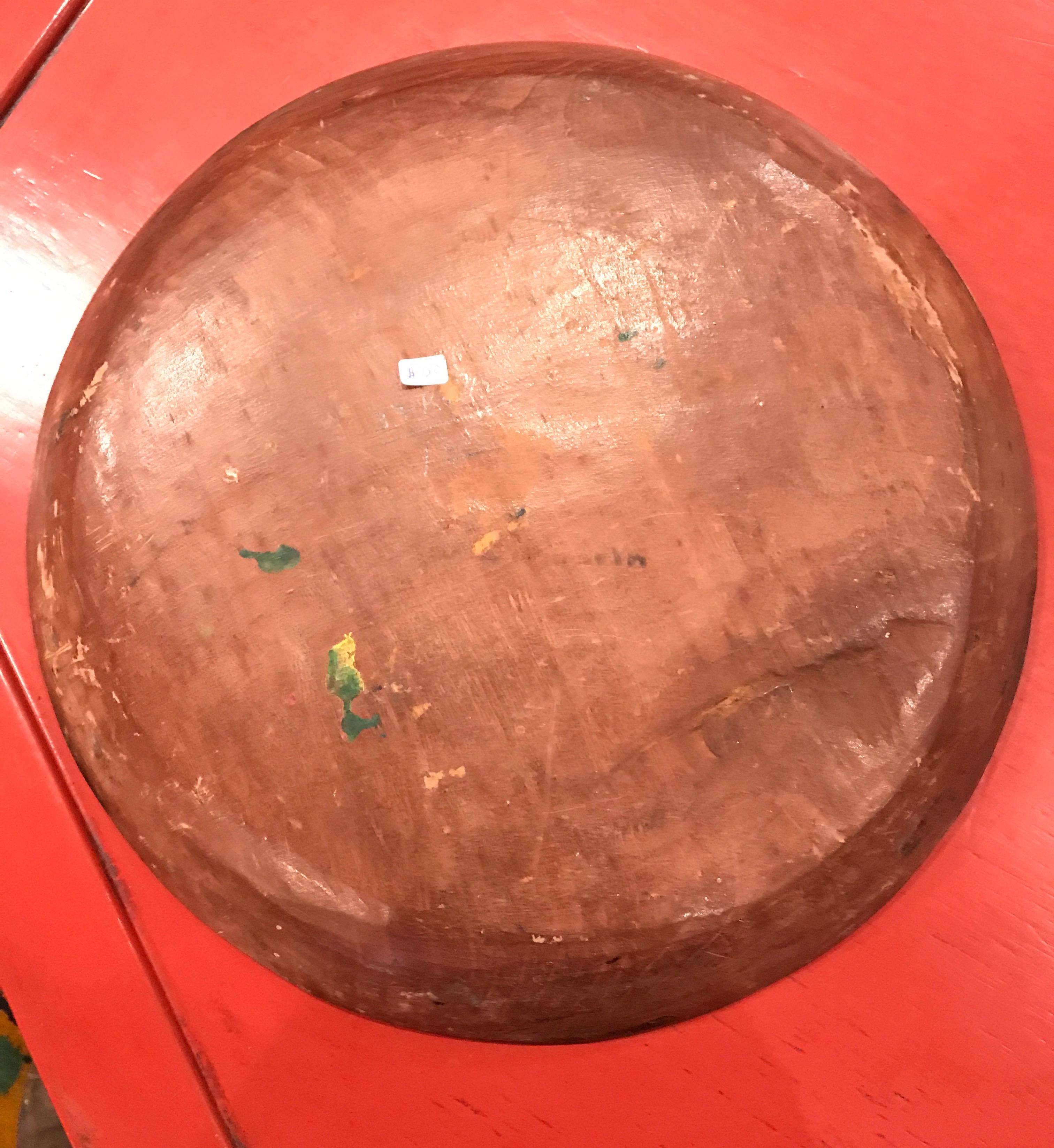 This 14-in. diameter bowl was hand painted in Mexico. The artistic brush strokes are carefully laid out to display color and simplistic brilliance.