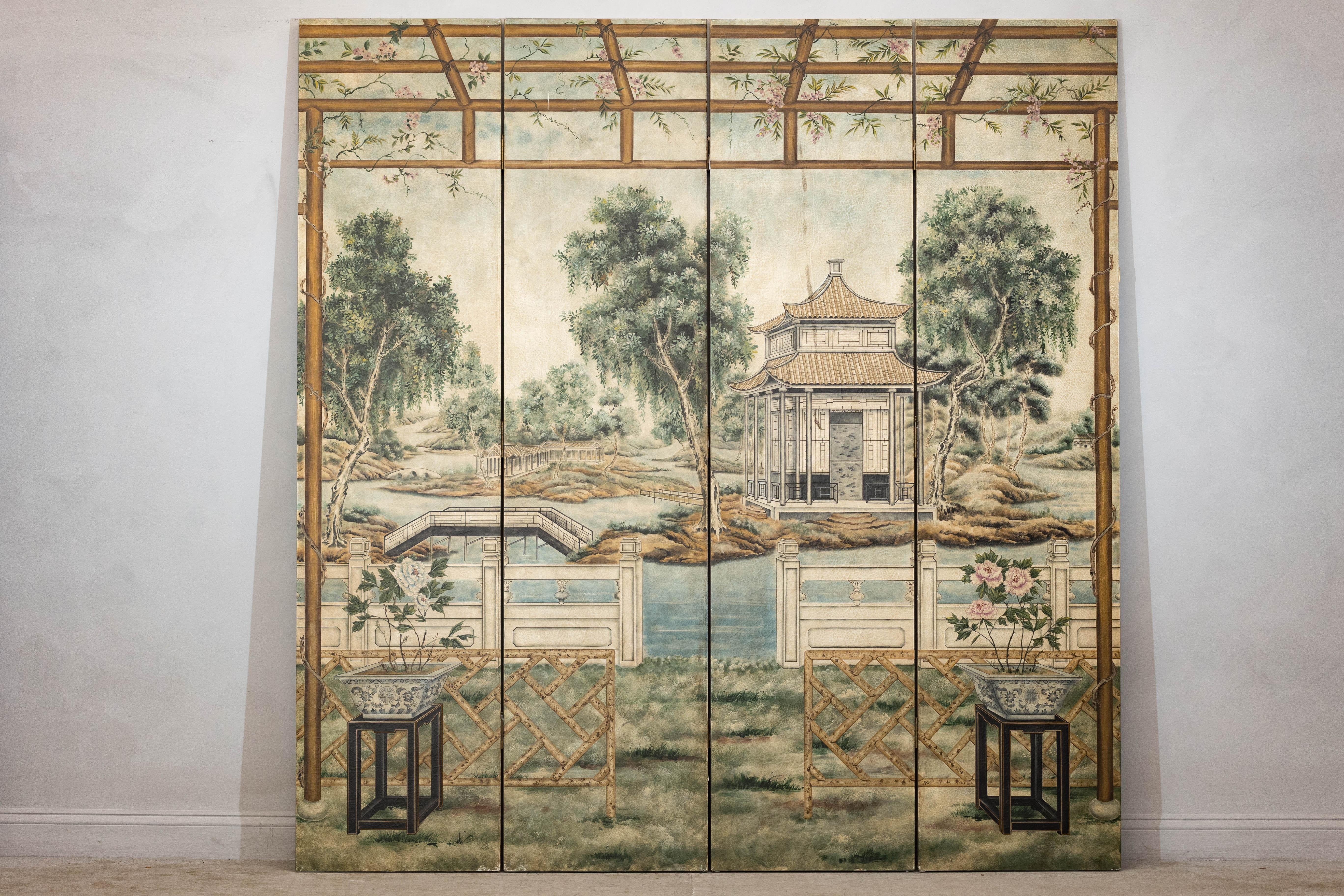 A four-panel folding screen depicting a serene Chinese garden landscape, this piece brings a sense of depth and tranquility to any interior. The detailed hand-painted scene captures a traditional garden view, complete with a pavilion, trees, and a