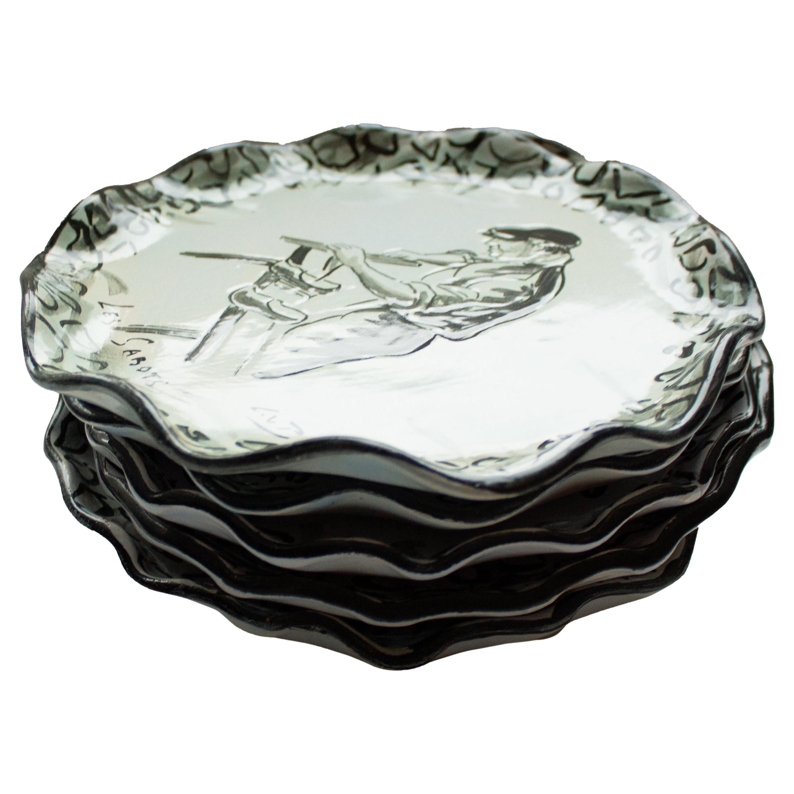 Ces charmantes assiettes rustiques françaises illustrent magnifiquement la vie rurale quotidienne grâce à de délicates scènes peintes à la main représentant des métiers traditionnels. Chaque assiette représente un métier différent - du boulanger au