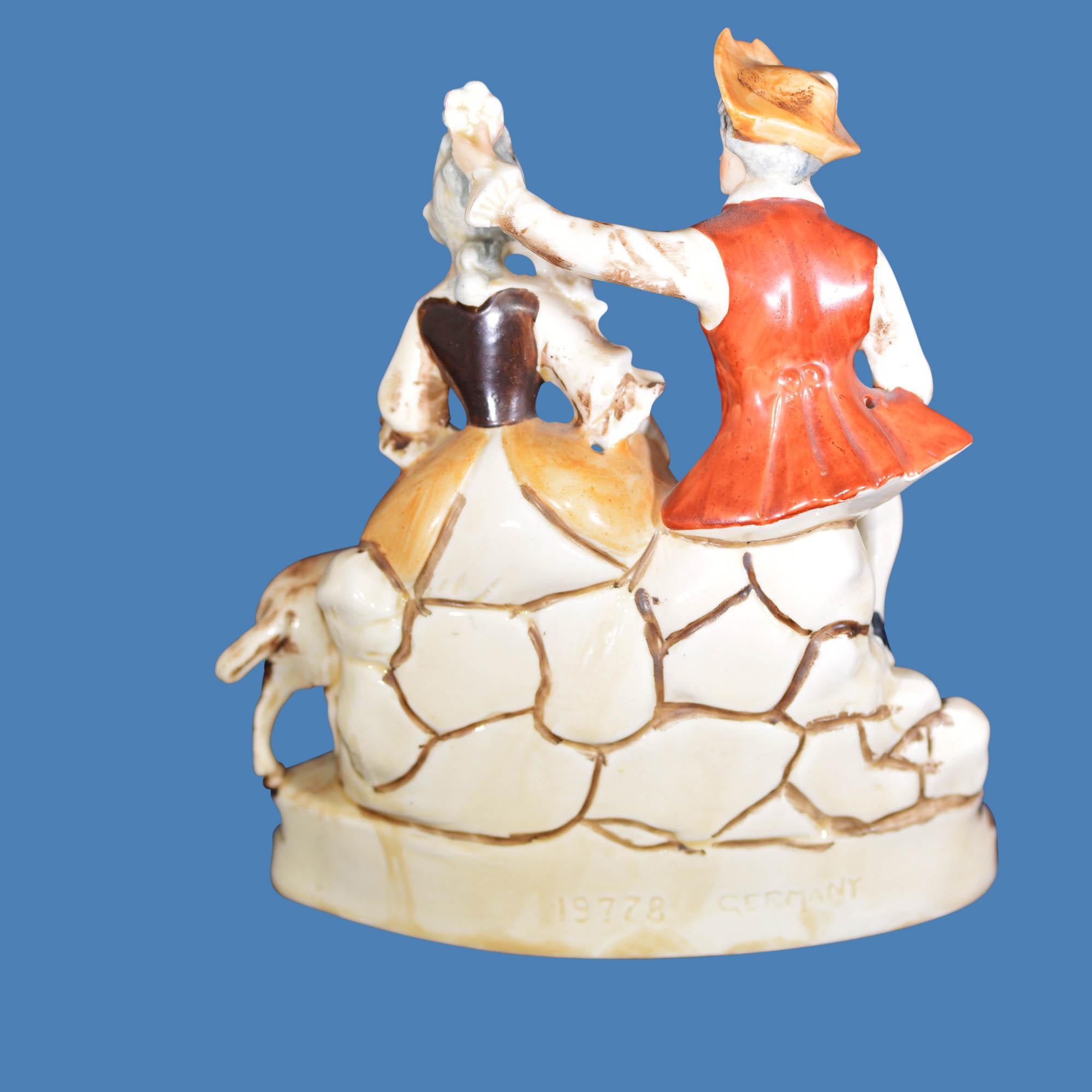 20th Century Hand Painted German Figurine Couple in Historic Dress