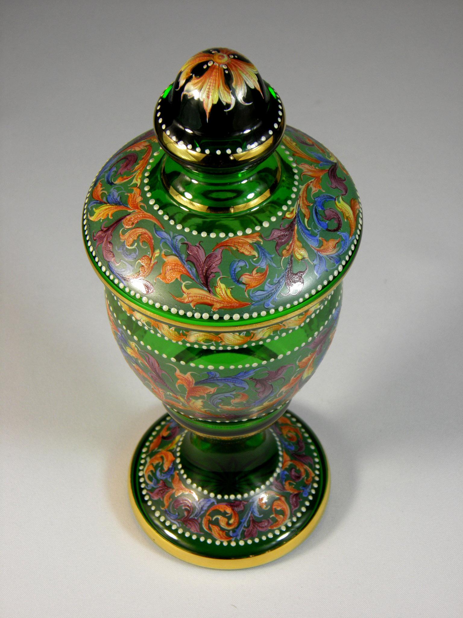 Handmade green glass goblet with lid, hand painted,
Everything is made by using original techniques,
Paints are fired at temperatures of 520-540 degrees Celsius.
Hand cut star at the bottom, made in a glass studio in northern Bohemia, 20th