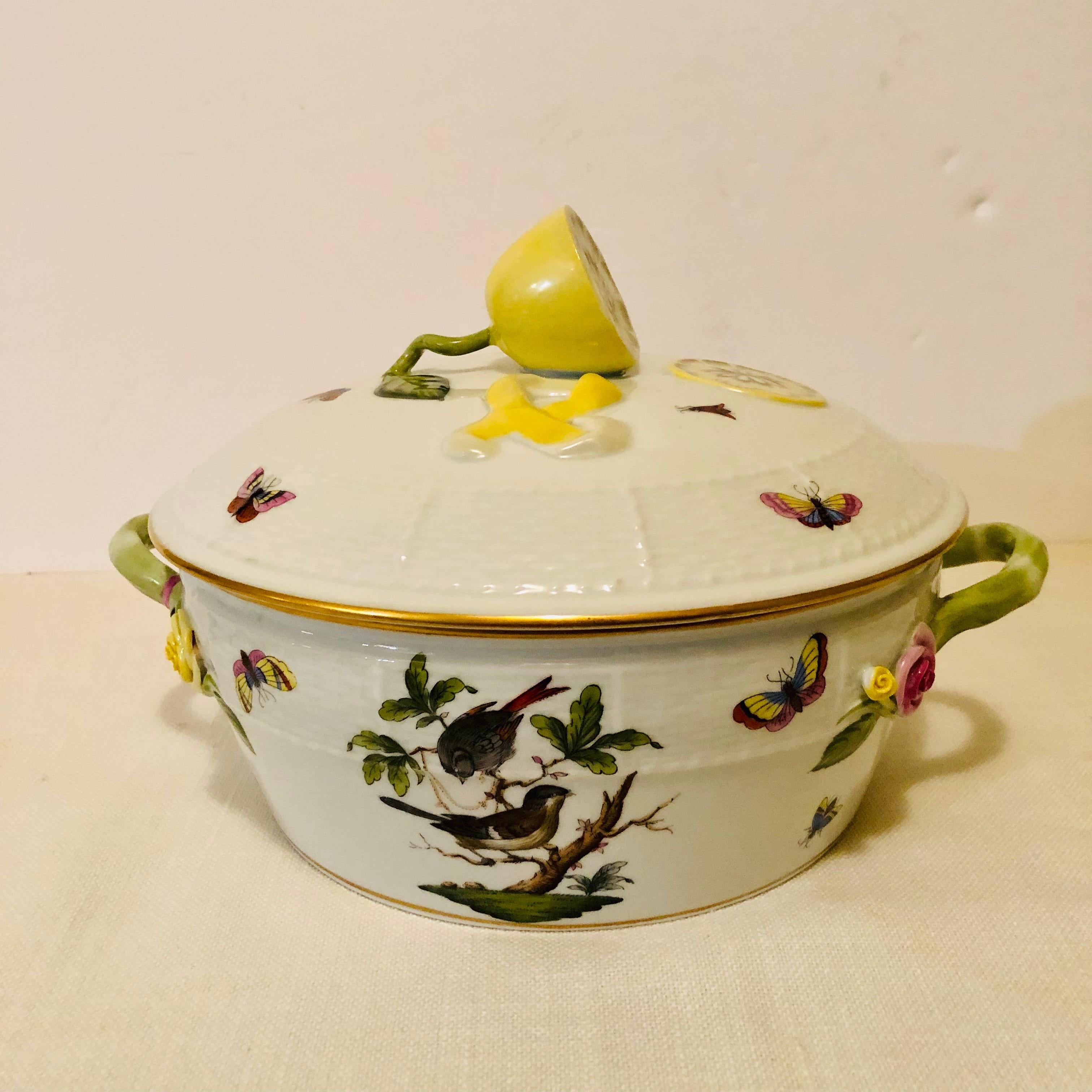 I am offering you the most wonderful and rare Rothschild Bird pattern covered bowl. The bottom of the covered bowl has a different pair of beautiful hand painted birds on both sides, which are surrounded by colorful butterflies and insects on a