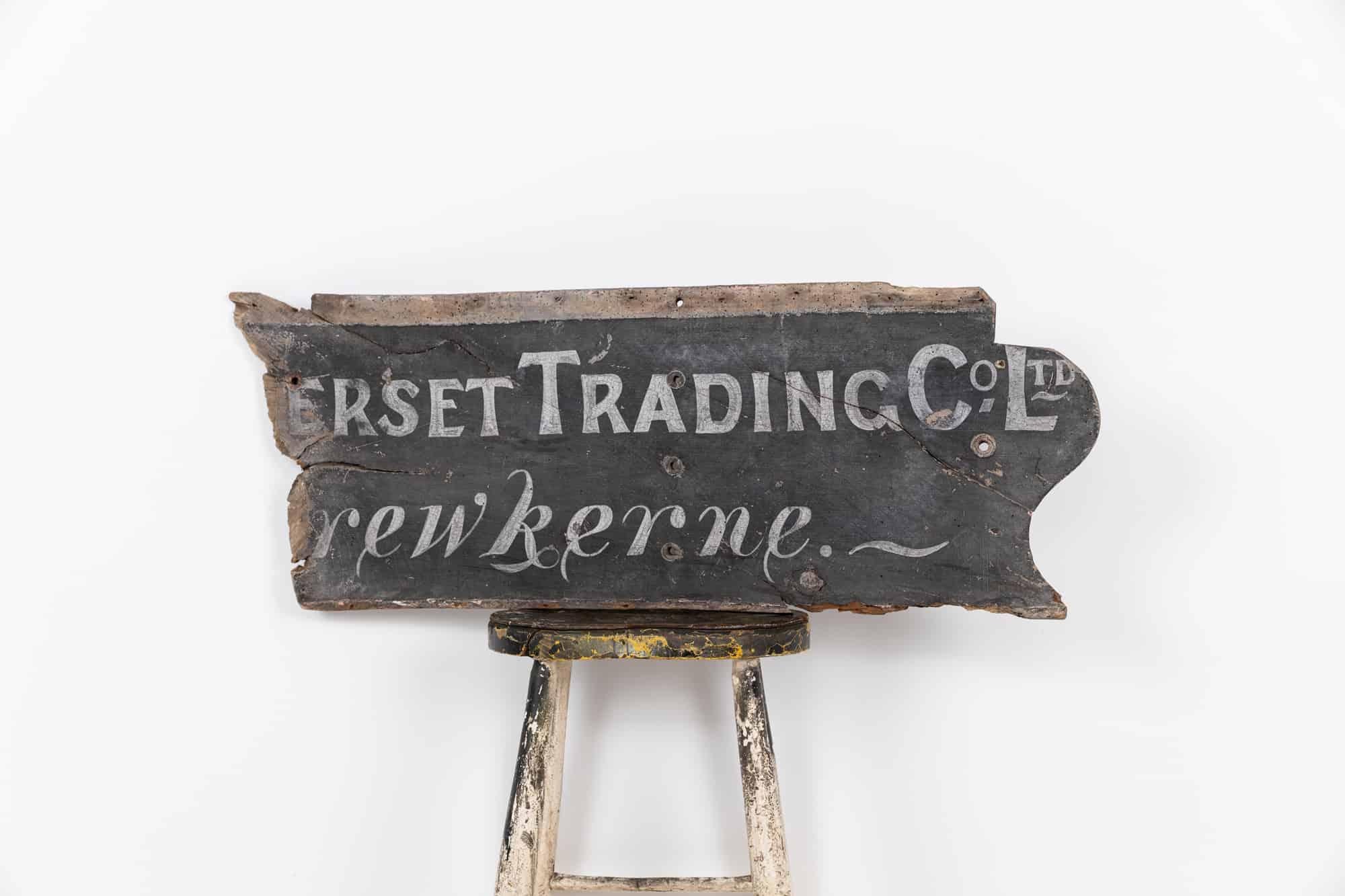 

A hand painted trade sign. c.1920

White hand painted type on black background for ‘The Somerset Trading Co. Ltd, Crewkerne’ on an ancient elm board.

Obvious loses, but an attractive and original piece nonetheless.

