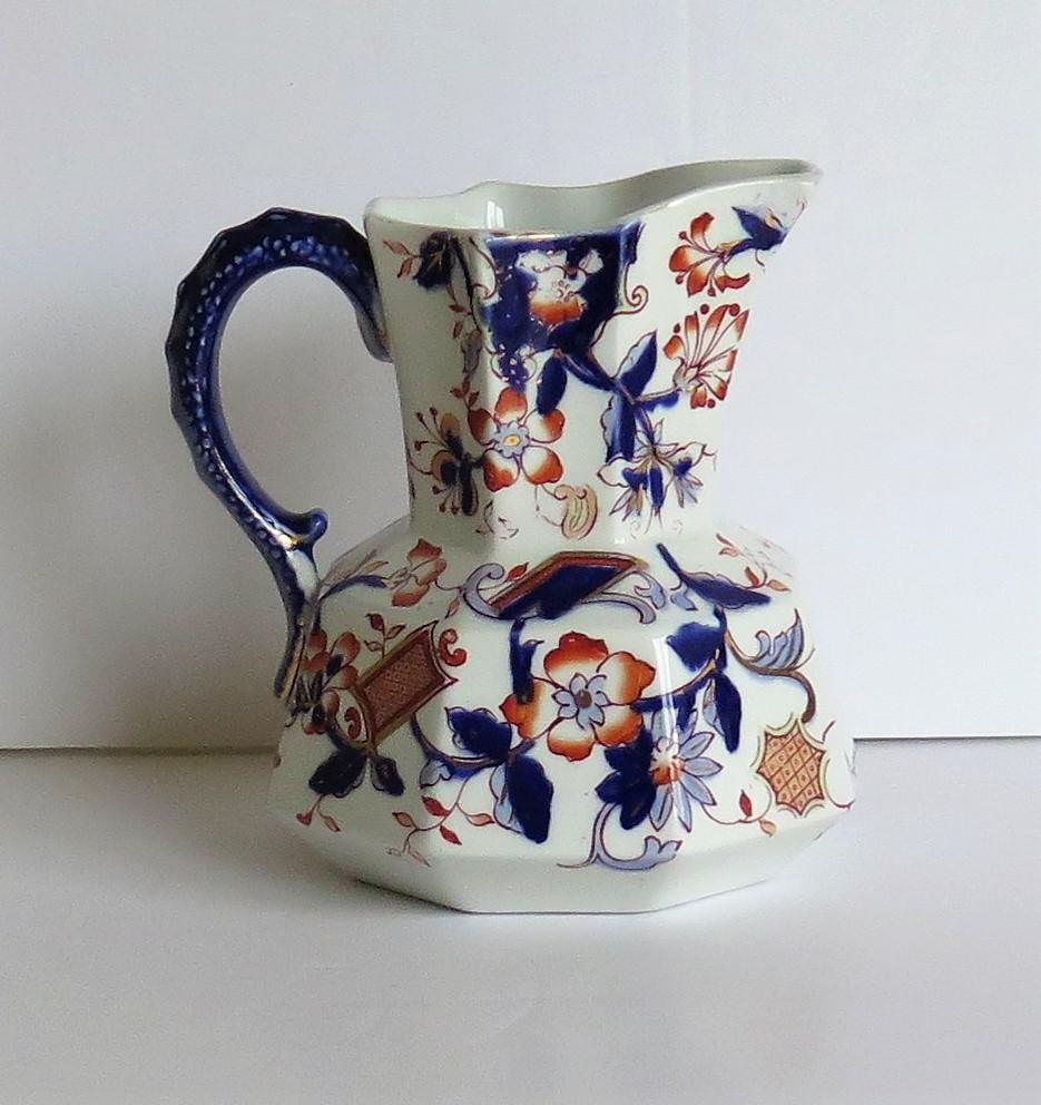 This is a good Ironstone hydra jug or pitcher in a hand painted chinoiserie pattern, made by one of the many Staffordshire Potteries of Victorian, England, circa 1880.

The jug is well potted in the 
