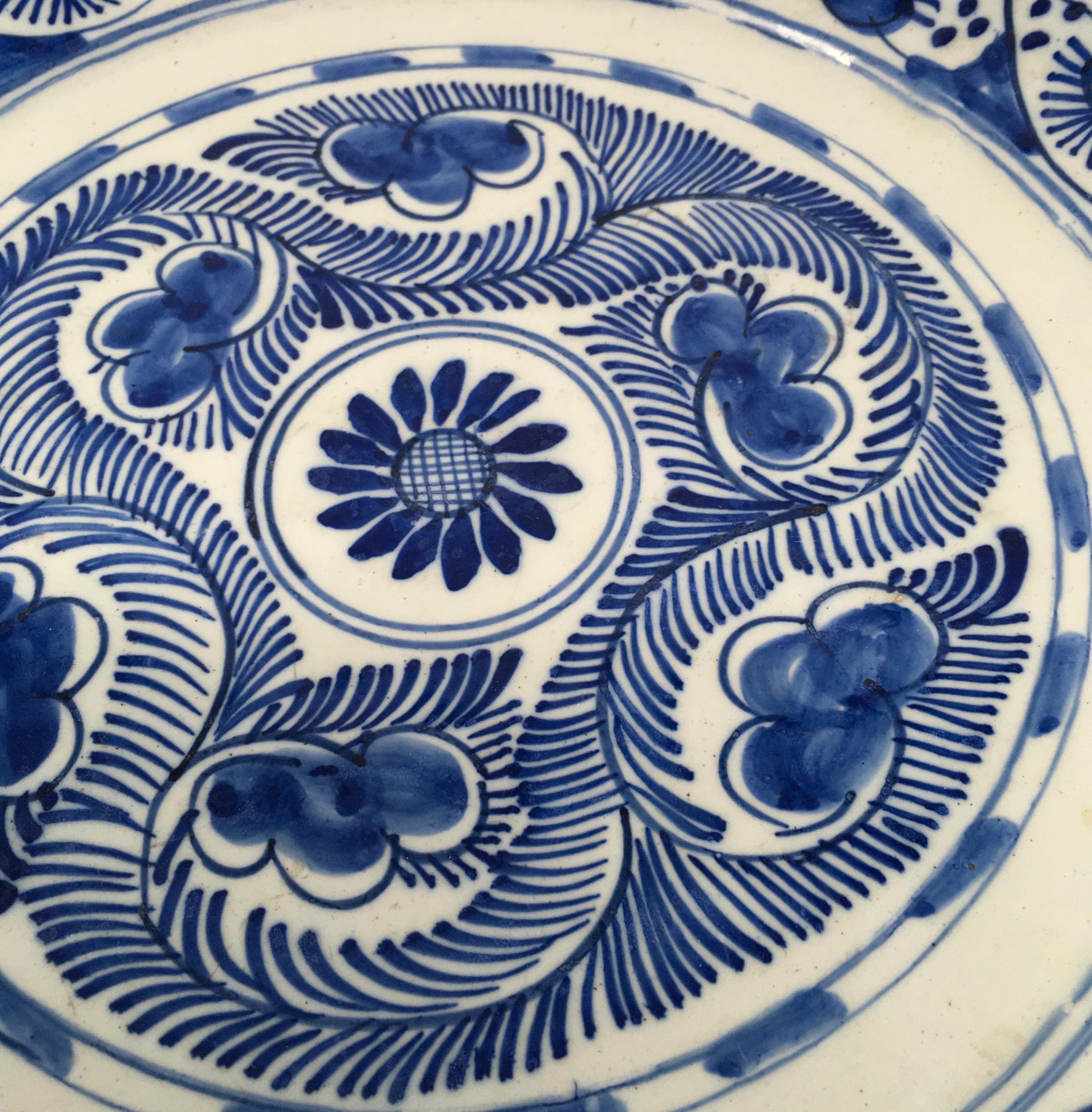 This hand painted Italian Deruta pottery plate has a rich blue patina. The hand painted detail is lovely. It has some nicks, however, we do not believe that these scares detract from the beauty of this plate.