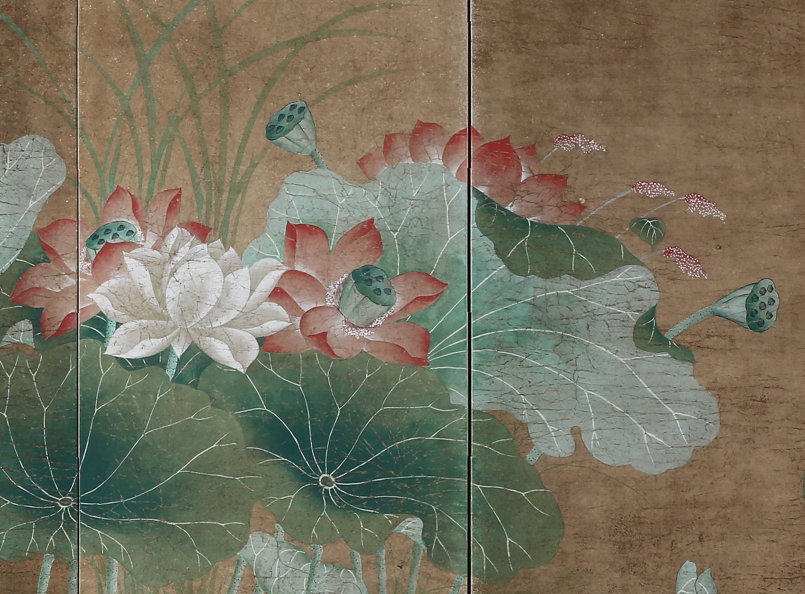 The lotus pond and mandarin ducks painting of this four-panel screen is hand painted in watercolor, on rice paper over carefully jointed wooden lattice frames. Lacquer rails are then applied to the perimeter to finish the edges of the screen and