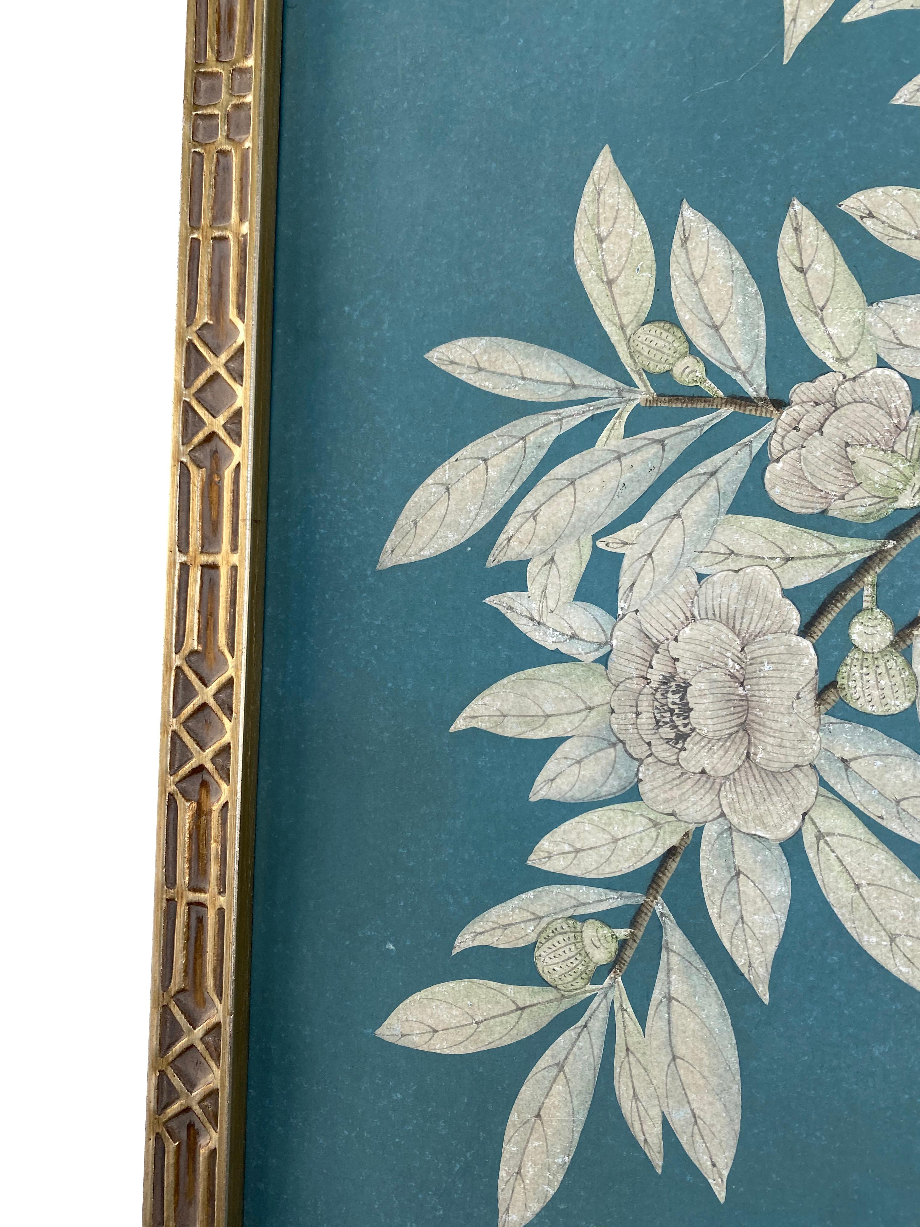 The most elegant hand painted wallpapers since 1898, this grand scale Gracie panel, in a silver leafed carved frame, depicts an Asian-style flowering tree with birds.

