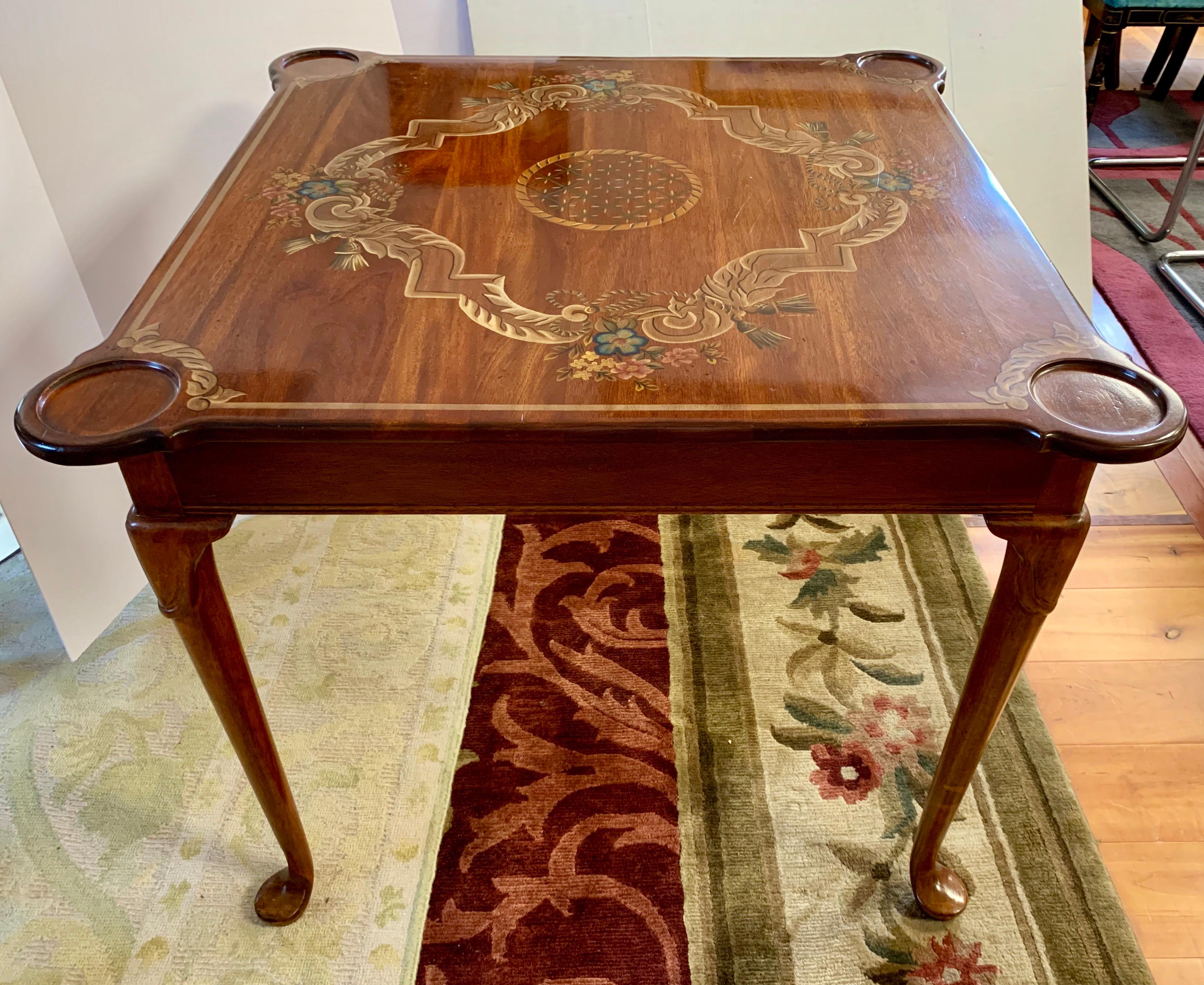 Exquisite hand painted square game table with curved edges for beverages or game pieces. Intricate hand painted design at top.