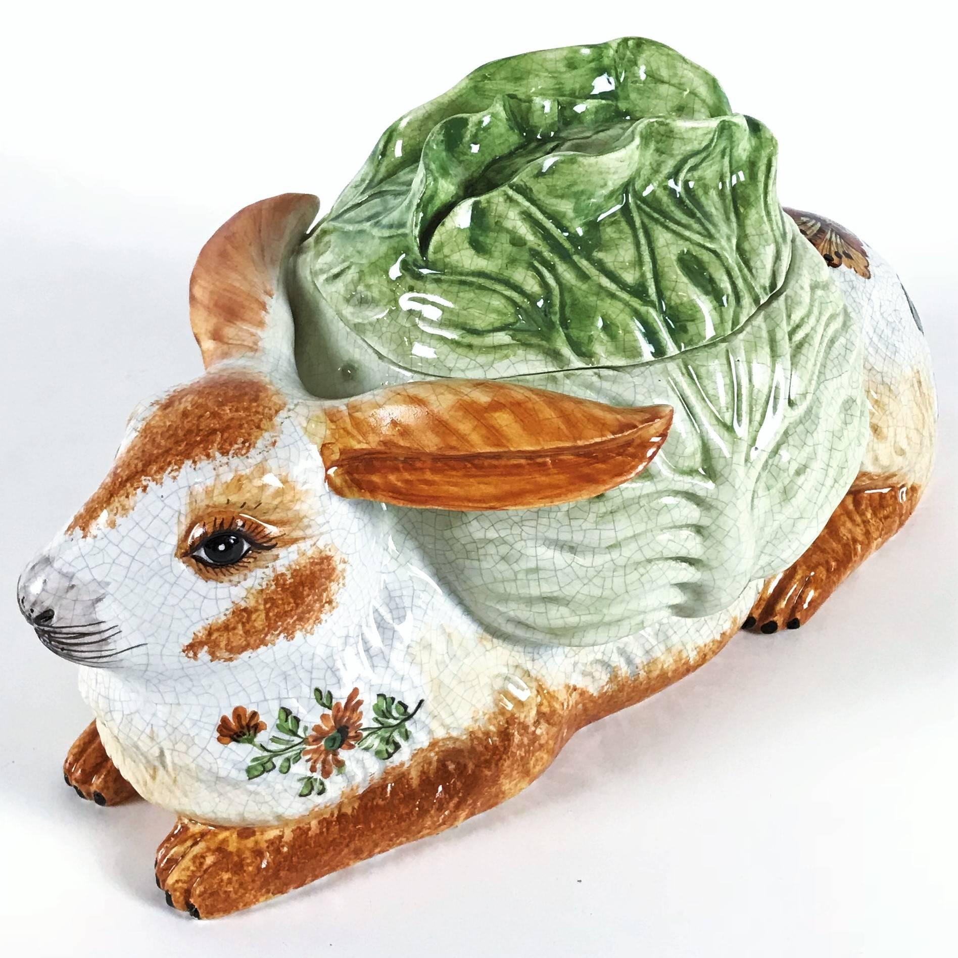 Unusual unique Italian handmade majolica rabbit with cabbage soup tureen and spoon. Lovely hand-painted flowers and details with very fine crackle glaze. Wonderful display piece.

Measures: 
Length 35 cm / 14 in. 
Height 19 cm / 7.5 in
Depth 23 cm /