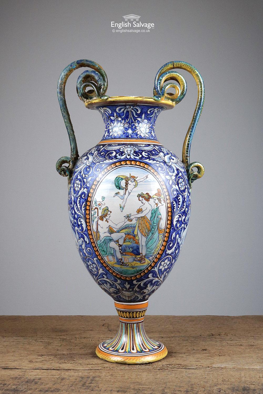 Classical hand painted Majolica vase in the style of the 19th century. Cantagalli. On the front Hermes or Mercury the messenger God is depicted hovering in the air above a pastoral scene where an apple is being handed to someone. The presence of