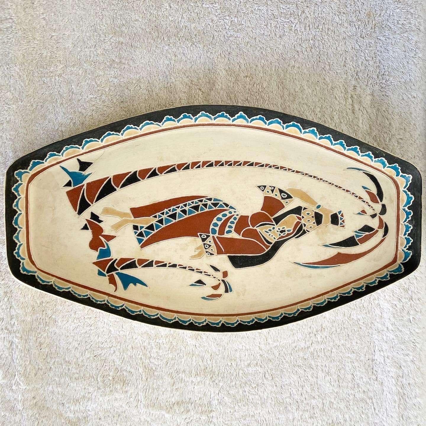 Amazing vintage middle eastern hand painted platter, made Is Israel. Features a lady carrying a jug on her head beneath a tree.
